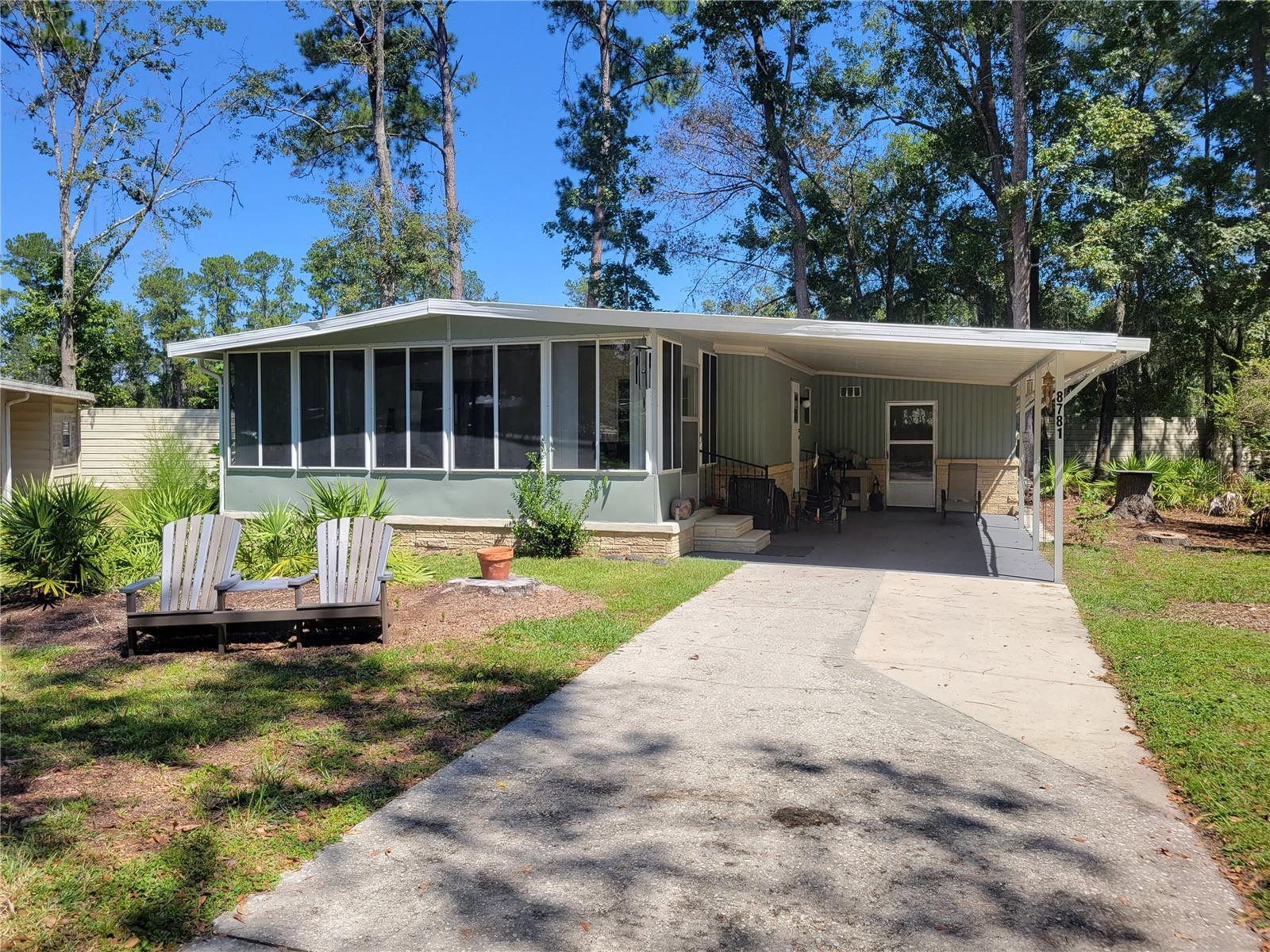 Move In Ready, 55+ Community located in NW Gainesville. Well-maintained 2 bedroom/2 bath home. Relax in your large screened porch and enjoy the quiet tree lined street. Interior of home has all laminate flooring. There is an attached one car carport. Community amenities include a pool, clubhouse, billiard hall, tennis courts, and shuffleboard.