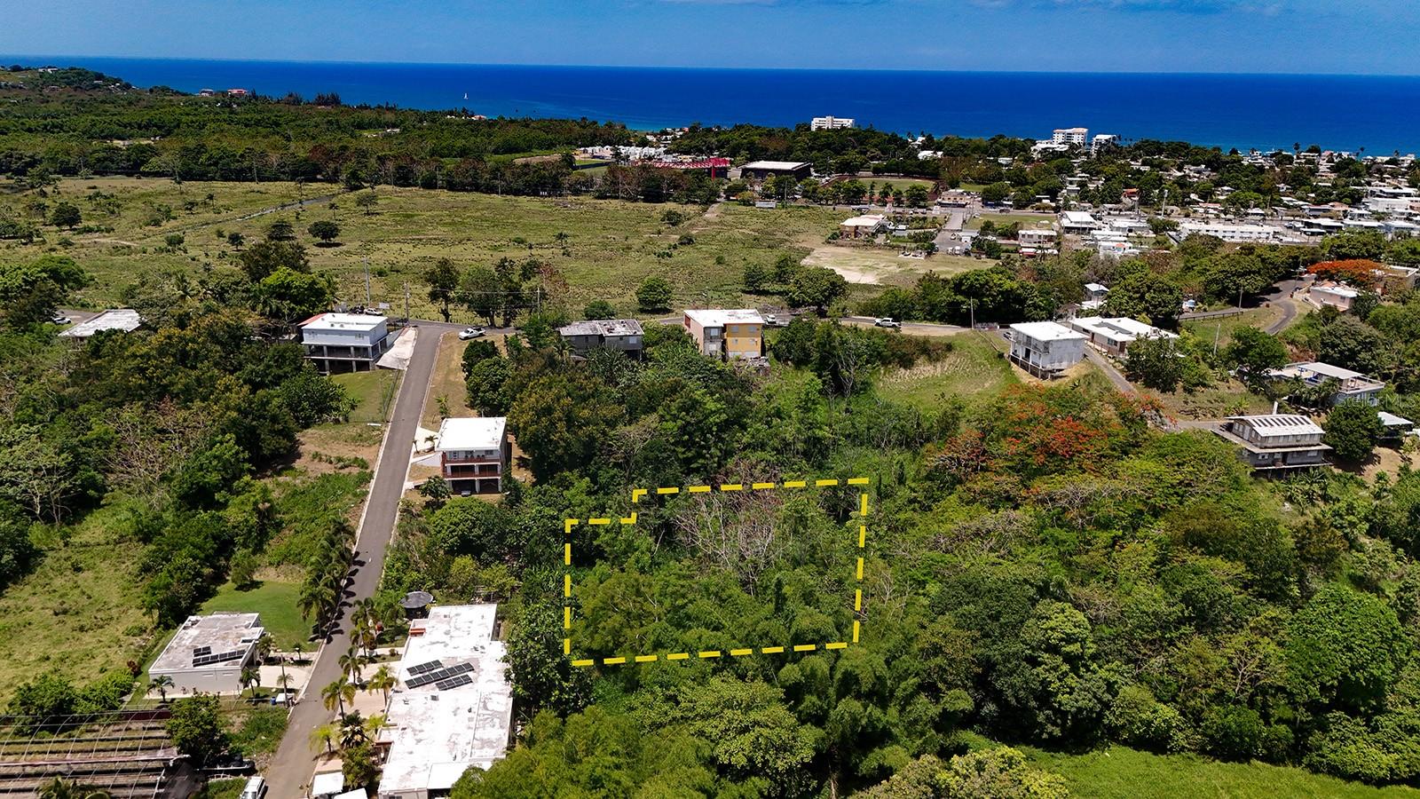 Discover the perfect balance of accessibility and serenity with this beautiful 1/3-acre lot,  less than 1,200 meters to the beach and just over 2 Km to the plaza of Rincon. Ideally situated just minutes from shopping, restaurants, schools, healthcare, and major transportation routes, this property offers the convenience of being close to everything you need while providing the peace and privacy you desire. Nestled in a quiet setting away from the hustle and bustle, the lot offers ample space to build your dream home, create outdoor living areas, and enjoy a relaxed lifestyle surrounded by nature. Whether you're looking for a primary residence, vacation retreat, or investment opportunity, this property delivers the rare combination of a peaceful atmosphere and easy access to modern amenities. Don't miss the opportunity to own a spacious homesite where you can enjoy quiet mornings, star-filled evenings, and the comfort of knowing that everything you need is just a short drive away. Where convenience meets tranquility.