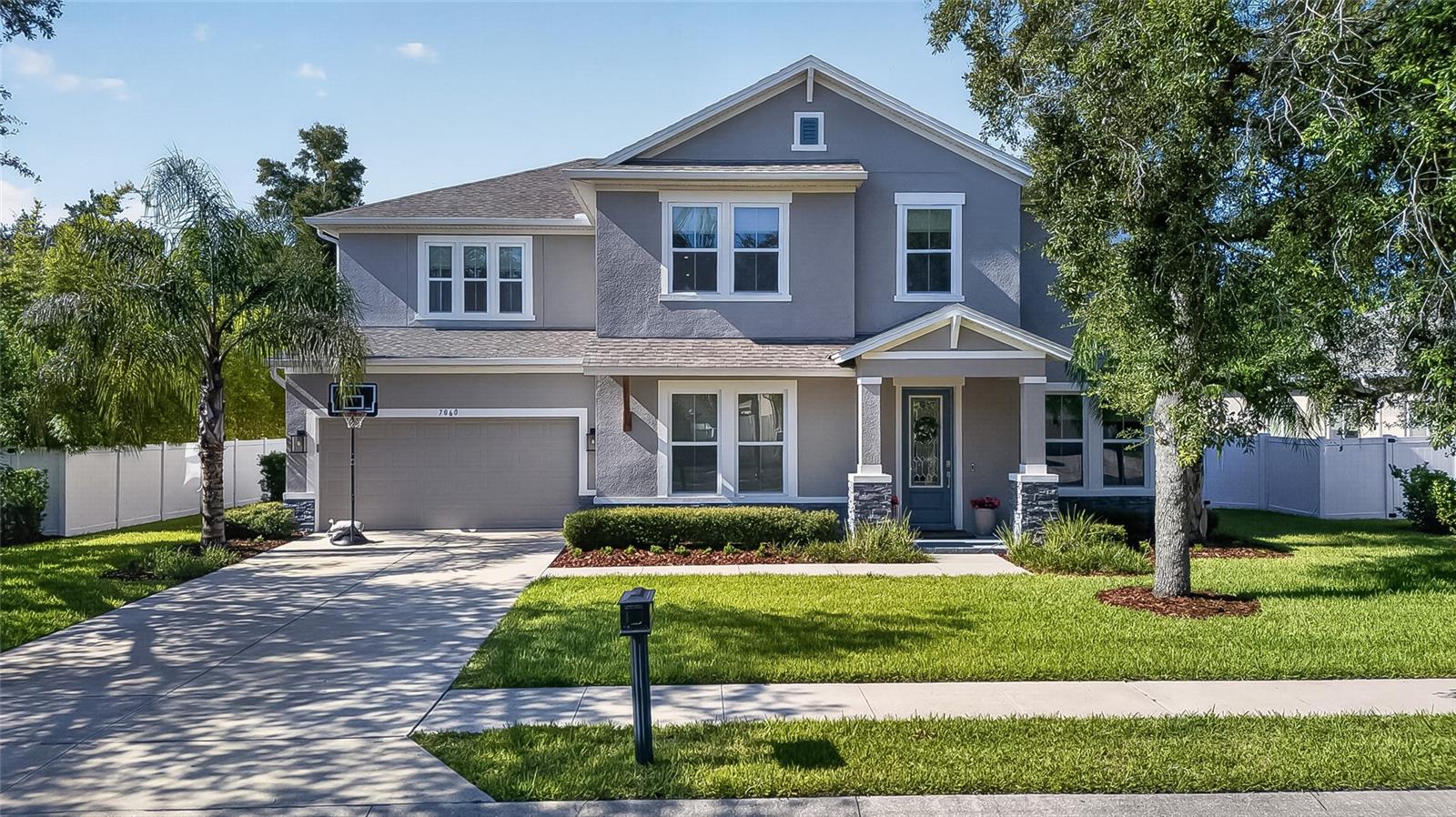 Under contract-accepting backup offers. CONSTRUCTED IN 2022 by luxury builder David Weekly homes, this "Like-New" luxury family home in Desirable Gated Community of Kenmure, combines easy elegance with streamlined versatility to adapt to your family's lifestyle changes through the years.  All the up to date select finishes.  This  5bd/4full bath home, Den, Study, loft many extra features with high efficiency requirements and the highest of standards is a must to see.   Cherish your relaxing sunsets and breezy weekends from the shaded bliss of your covered front porch, backyard lanai, and private covered balcony.  Your awe-inspiring Owner's retreat provides a glamorous  way to begin and end each day with a spa-day bathroom and a luxurious walk-in closet.  Each addition bedroom presents  a delightful place for growing personalities to shine.  Build lifelong memories together in the incredible  upstairs retreat and craft your perfect specialty room in the downstairs den/study.  Your open-concept floor plan offers an impeccable space to play host to picture-perfect movie nights and  brilliant social gatherings.  The chef's specialty kitchen supports the full variety of cuisine exploration, stainless steele appliances  and includes a quartz presentation island and an oversized pantry, open and bright concept.   Livability enhancements include a built-in Mud Room, a staircase closet, 3-car garage and fabulous wood swing playset in the lush over sized fenced backyard. Conservation in back to maintain privacy. This home features hurricane/double pane windows, inter- wall pest control, 2 water heaters, automatic ventilation control, rain bird and Mitech security system and much much more.  Sought after location in Seminole County with A-rated schools, close to restaurants, shopping, 408 and 417 highways and UCF.