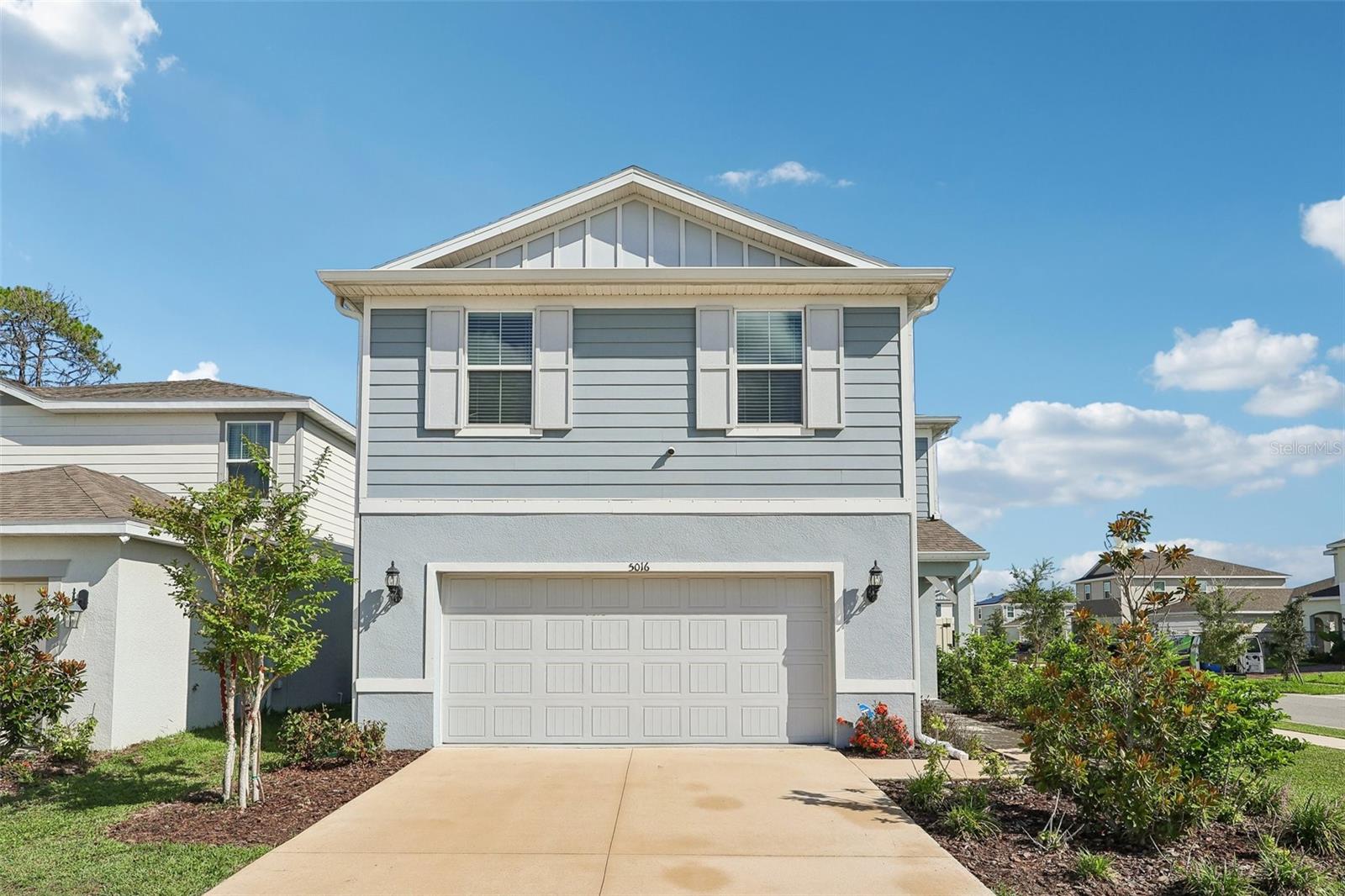 Welcome to your dream home at 5016 Blue Hammock Court! Perfectly situated on a premium corner lot in the highly sought-after Cypress Hammock community, this thoughtfully designed two-story "Tybee" model by Pulte Homes offers the perfect blend of luxury, comfort, and convenience. Featuring 5 spacious bedrooms, 3 full bathrooms, an expansive upstairs loft, and a 2-car garage, this home is engineered to effortlessly handle both busy family life and upscale entertaining.

Step inside to find stunning Positano  porcelain tile flooring sweeping across the entire first-floor living areas. The heart of the home is an open-concept chef’s kitchen featuring bright  Fairview cabinetry, premium Lagoon quartz countertops, a sleek Tender Gray subway tile backsplash, a functional center island, and high-end Whirlpool appliances. The kitchen flows seamlessly into the bright café and gathering room, which opens directly onto a covered lanai—your own private oasis overlooking a spacious backyard perfect for indoor-outdoor living. Convenience is key with a full bedroom and bathroom on the main level, ideal for a home office or visiting guests.

Upstairs, a massive central loft serves as a second living space, surrounded by the laundry room, three additional bedrooms, a third full bath, and the luxurious Owner’s Suite. The primary suite serves as a true retreat, complete with a massive walk-in closet and an en suite bathroom boasting dual sinks, quartz countertops, and a massive walk-in shower.

The seller is slightly motivated and ready to review offers, making this an exceptional and rare opportunity to skip the wait of new construction and secure a pristine, turnkey property.