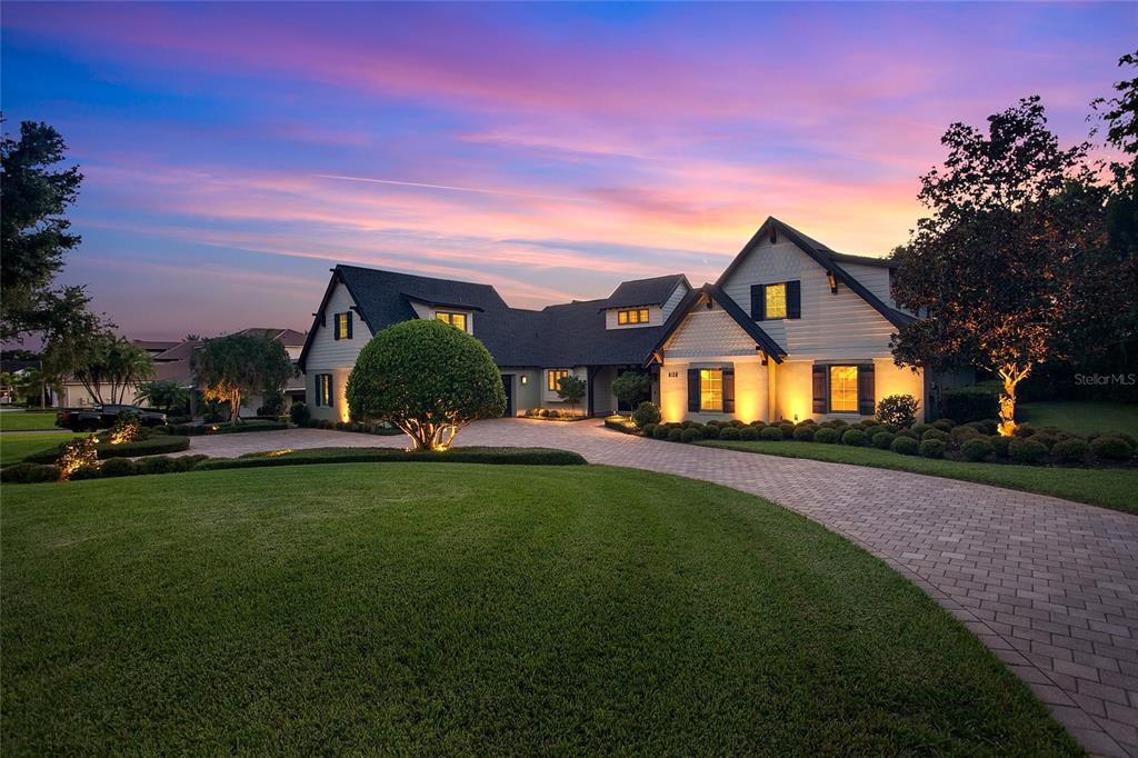 Prepare to be amazed! Stunning, one-of-a-kind amazing home in Bay Hill, home of the Arnold Palmer Invitational!  This completely updated home directly overlooks the green and pond of Bay Hill’s signature 18th hole. Imagine watching the PGA Tournament champion sink the winning putt from your backyard!  The recent renovations to this Tudor style home give it all the extra attractive features you have been looking for. As you enter the home you are greeted by a vaulted ceiling with beautiful wood beams opening on to the grand room. The kitchen is large and ideal for entertaining with features such as granite counters, Wolf and Subzero appliances, wine fridge, incredible views, and easy access to the grand outdoor area. The main bedroom is just off the living room with a massive closet featuring its own fireplace!  The master spa bath has dual shower heads on either end and a rain shower in the middle, in addition to beautiful travertine tile and a modern jetted whirlpool bath. Off the main room is a bonus room that can easily double for an office or den.  One set of stairs leads to two bedrooms and a full bath. The other set of stairs is off the kitchen and leads to a separate bedroom and full bath perfect for guests!  As astonishing as the interior is, the expansive outdoor area is truly paradise.  The covered deck is spacious and is an ideal spot to sit and watch the stunning sunsets and enjoy the fireworks from Disney!  The saltwater pool and spa with fully controllable LED lighting was professionally designed to take advantage of the views.  This home is perfect in just about every way!

Click on the 'Virtual Tour 1' link for a full Matterport 3D Virtual Tour of the home