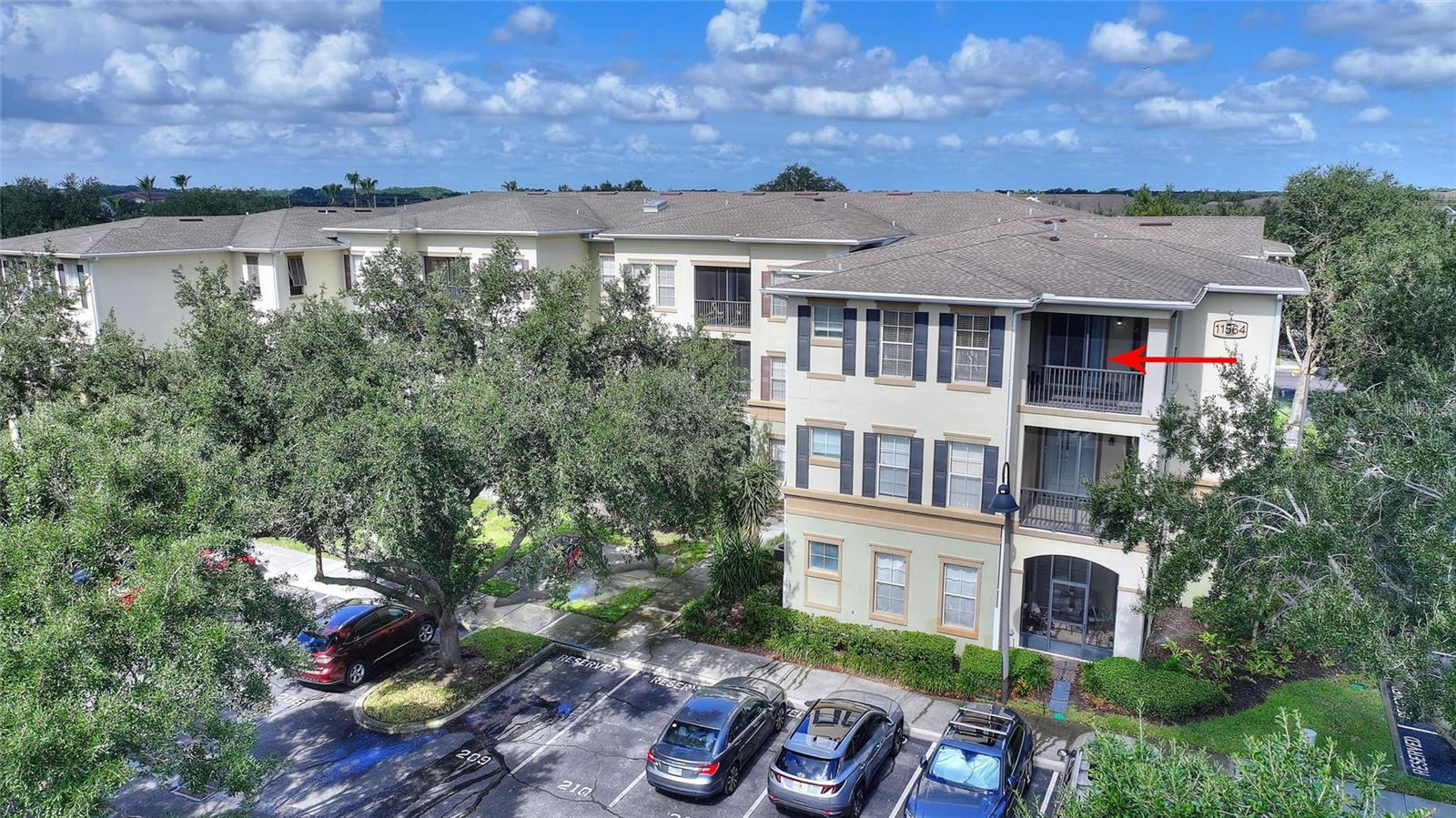 Welcome to this gorgeous 3-bedroom, 2-bath  corner unit condo in the highly desirable Lakeside at Lakes of Windermere! This beautifully maintained community is just minutes from the world-class shopping, dining, and entertainment of both Windermere and Winter Garden. Many dining choices as well as Publix are also within easy walking distance. Residents enjoy exceptional amenities, including a resort-style pool, clubhouse, and state-of-the-art fitness center, making this community a wonderful place to call home. Take the elevator to the third floor, where you'll find Unit 923, privately situated at the end of the walkway. This third-floor location offers a quieter experience with no neighbors above the unit, as well as a more private corner unit and wrap around patio. Step inside to discover attractive tile flooring throughout the main living area where the large living room, dining area, and kitchen are designed with an open-concept floorplan in mind, paired with great natural light, the living area is light, bright, and spacious. The primary suite is thoughtfully positioned just off the living area and features a large bedroom, an oversized walk-in closet, and a private en-suite bathroom. A split-bedroom floor plan provides additional privacy, with two guest bedrooms and a full guest bathroom located on the opposite side of the condo. The guest bathroom offers dual access from both the hallway and one of the guest bedrooms, creating a convenient layout for visitors or family members. The in-unit laundry is conveniently located in the hallway near the guest bedrooms. NEW HVAC 2024! NEW REFRIGERATOR, RANGE, MICROWAVE, DISHWASHER, WASHER, and DRYER ALL IN 2024! Schedule your private showing today!