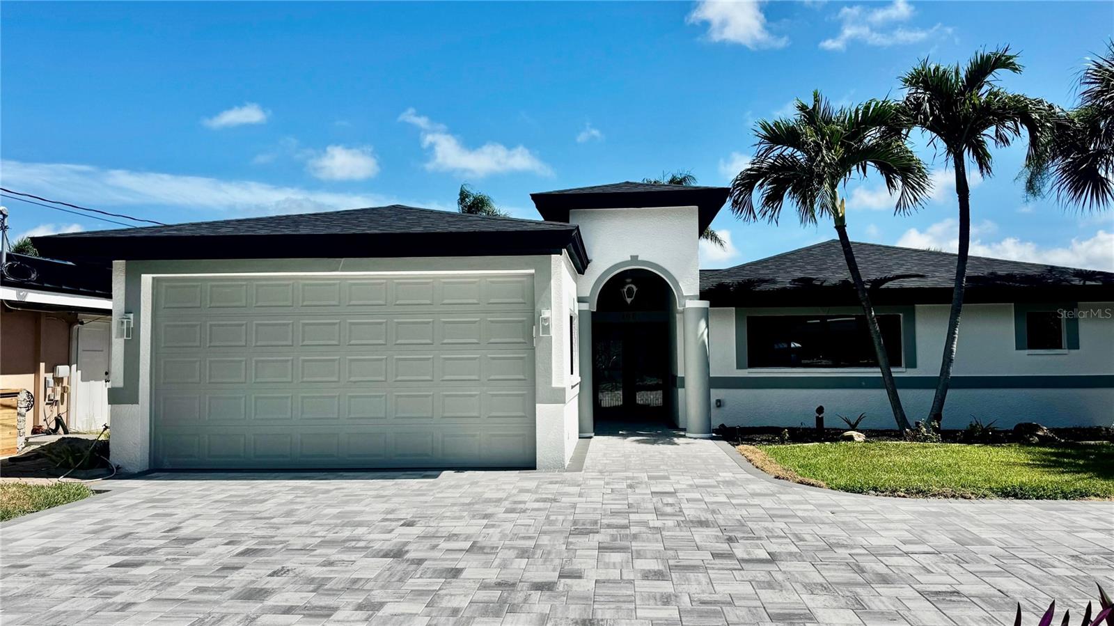 Stunning home in one of Clearwater's most exclusive waterfront channels steps from the beach and with direct gulf access. As you step inside, you’re greeted by a breathtaking, soaring foyer with high ceilings that immediately take your breath away. Porcelain floors flow seamlessly throughout, reflecting the shimmering water views. The open-concept kitchen is a chef’s dream, complete with a walk-in pantry and a spacious layout. Each of the three fully remodeled bedrooms are generously sized, while the large game room with a cozy fireplace for entertaining. Additional luxuries include a large laundry room, bar area, two AC units, and a circular driveway. Every inch of this home has been meticulously upgraded. 

Step outside to your low-maintenance backyard with premium artificial turf, palm trees, and herb garden, designed for easy living and year-round enjoyment. Relax in your private hot tub or head down to your waterfront fishing dock with boat cover to catch a sunset or a fish! 

Whether you’re looking for a primary residence, second home, or investment property, this waterfront gem is it! With no more channels being built in this area, this home is truly irreplaceable and presents an opportunity that will never be duplicated. No HOA

Improvements:
Complete house remodel: 2024
Roof: 2025
Pavers front and backyard: 2026
Water heater: 2024
Impact garage door: 2025
 Hot tub: 2026