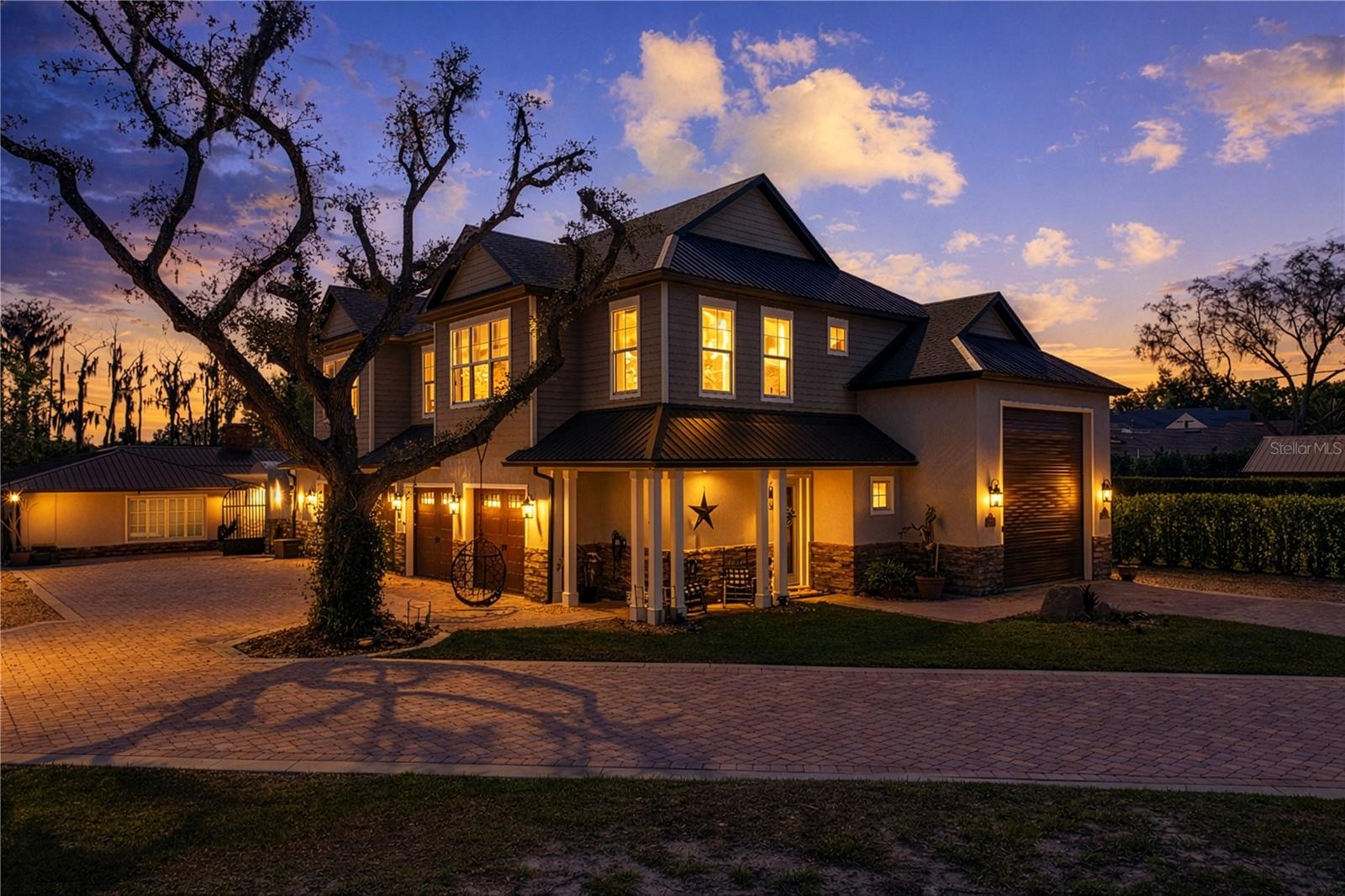 Price Adjustment!  

Lakefront Living in the Heart of Windermere – A Rare Opportunity for Multigenerational Luxury

Situated along the tranquil, open waters of Wauseon Bay—part of the world-renowned Butler Chain of Lakes—this expansive estate on prestigious Lake Butler Boulevard is more than just a home: it’s a lifestyle destination, purposefully designed to inspire connection, relaxation, and recreation. With its flexible layout, multiple living spaces, and resort-style amenities, it offers the perfect setup for multigenerational living without compromise.

From the moment you arrive, you’ll sense the pride and care that has gone into crafting this one-of-a-kind residence. Meticulously expanded and improved over decades, the home features five generously sized bedroom suites, including a luxurious owner’s retreat with fine finishes and boutique-style custom closets. Whether accommodating extended family, live-in help, or guests, everyone enjoys their own private space.

For culinary enthusiasts and entertainers alike, two full gourmet kitchens—one upstairs and one downstairs—provide unmatched convenience and versatility. Host formal holiday gatherings, casual poolside brunches, or multiple family dinners with ease. Both kitchens are thoughtfully appointed with high-end appliances and stylish finishes that reflect the home’s refined character.

The garage is a masterpiece in itself, built to accommodate your most ambitious lifestyle. Store your 45-foot Prevost RV with full hookups—sewer, water, cable, and power—or tuck away your 50-foot center console, classic cars, or workshop equipment in the four additional bays. Whether you’re an adventurer, collector, or weekend explorer, this space is a rare find in residential real estate.

Outdoor living takes center stage. A private beach invites sunbathing and quiet reflection by day, while the oversized gas fire pit becomes a natural gathering point at night for family, friends, and unforgettable moments. The resort-style pool area includes a gas fireplace and summer kitchen, perfect for year-round entertaining. Speakers are integrated throughout both indoor and outdoor spaces, creating a seamless atmosphere of leisure and luxury.

Inside, modern comforts abound: three zoned A/C units with Nest thermostats, two tankless gas water heaters, and a finished storage area above the garage offer functionality and peace of mind.

Located in the highly coveted Town of Windermere, residents here enjoy more than just natural beauty—they cherish a community rooted in tradition, charm, and quality of life. Walk to the Farmer’s Market, explore local parks, or attend beloved events like food truck nights, craft festivals, and holiday parades. The town library, family-owned shops, and quaint cafes further enhance the walkable lifestyle.

Minutes away, you’ll find world-class golf, upscale shopping, fine dining, and easy access to highways leading to Orlando’s top attractions, excellent schools, and international airport.

As an added value, completed architectural plans by Dirk Arace of Arace Designs are available, offering an exciting opportunity to customize or expand the estate with one of Central Florida’s most respected designers.

Whether you’re seeking a private lakeside sanctuary, a home for generations, or a place to live your dream by the water, this Windermere gem is truly extraordinary.  Listing agent is owner of the property.