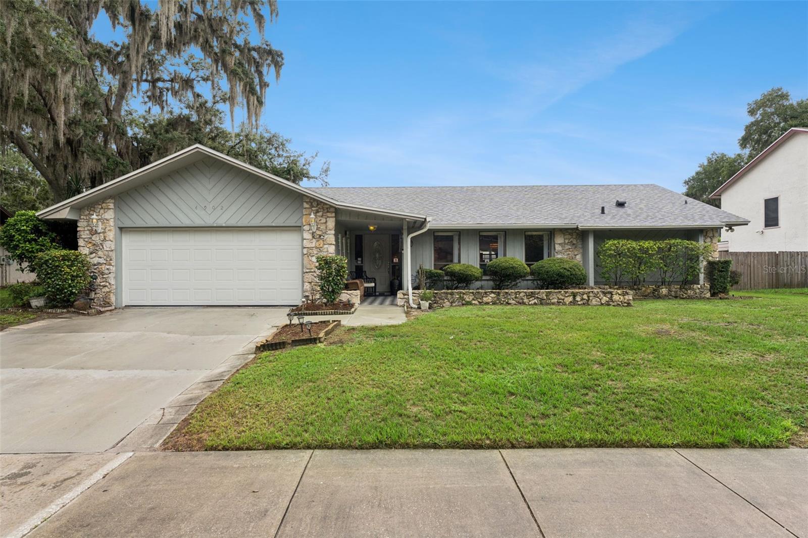 Welcome home to this spacious 4-bedroom, 2-bath pool home nestled on an oversized lot in the established Rosemont community of Orlando. Offering over 2,100 square feet of living space, this well-designed split-bedroom floor plan features vaulted ceilings, abundant natural light, and multiple gathering areas perfect for both everyday living and entertaining.
The heart of the home includes a generous kitchen with stone countertops, ample cabinetry, and an adjoining dining area that flows seamlessly into the family room. Cozy up by the wood-burning fireplace or step outside to your private backyard oasis featuring a screened-in pool and spa, ideal for enjoying Florida living year-round.
Situated on approximately a quarter-acre lot with mature landscaping and beautiful oak trees, this property offers both privacy and curb appeal. Additional highlights include a 2-car garage, spacious bedrooms, and a convenient location near shopping, dining, major roadways, downtown Orlando, and area attractions.
Whether you're looking for room to grow, space to entertain, or a place to create lasting memories, this home delivers the perfect combination of comfort, functionality, and Florida lifestyle. Schedule your private showing today!