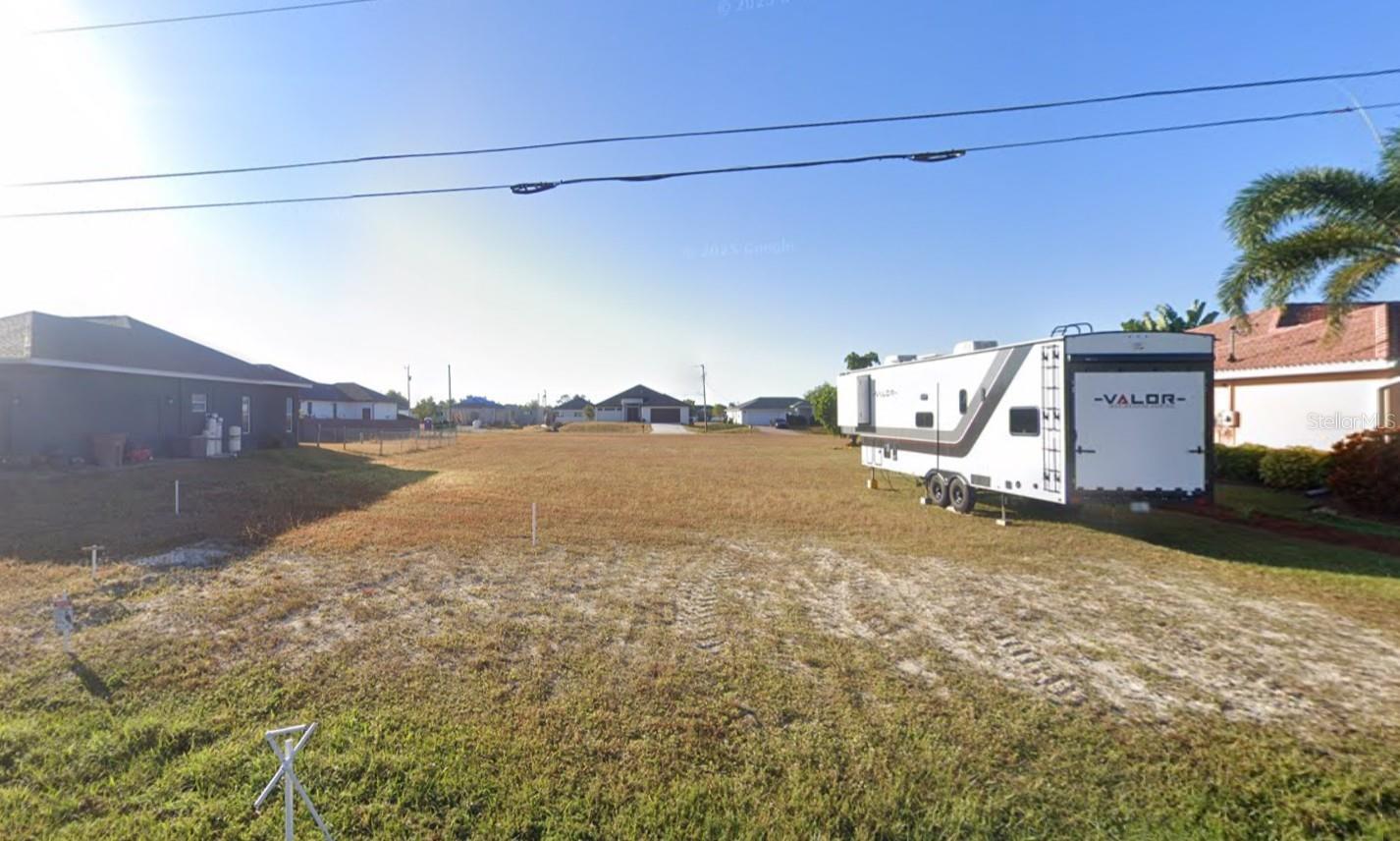 Price Drop! Build your custom home on this 0.23-acre residential lot located in the rapidly developing Northwest Cape Coral area. Surrounded by ongoing construction and established homes, this property offers strong potential for both end-users and investors. Conveniently positioned near Burnt Store Rd, providing access to shopping, dining, schools, and recreational amenities, as well as boating and waterfront activities Cape Coral is known for. No HOA restrictions. Buyer to verify zoning, utility availability, and building requirements with the City of Cape Coral.