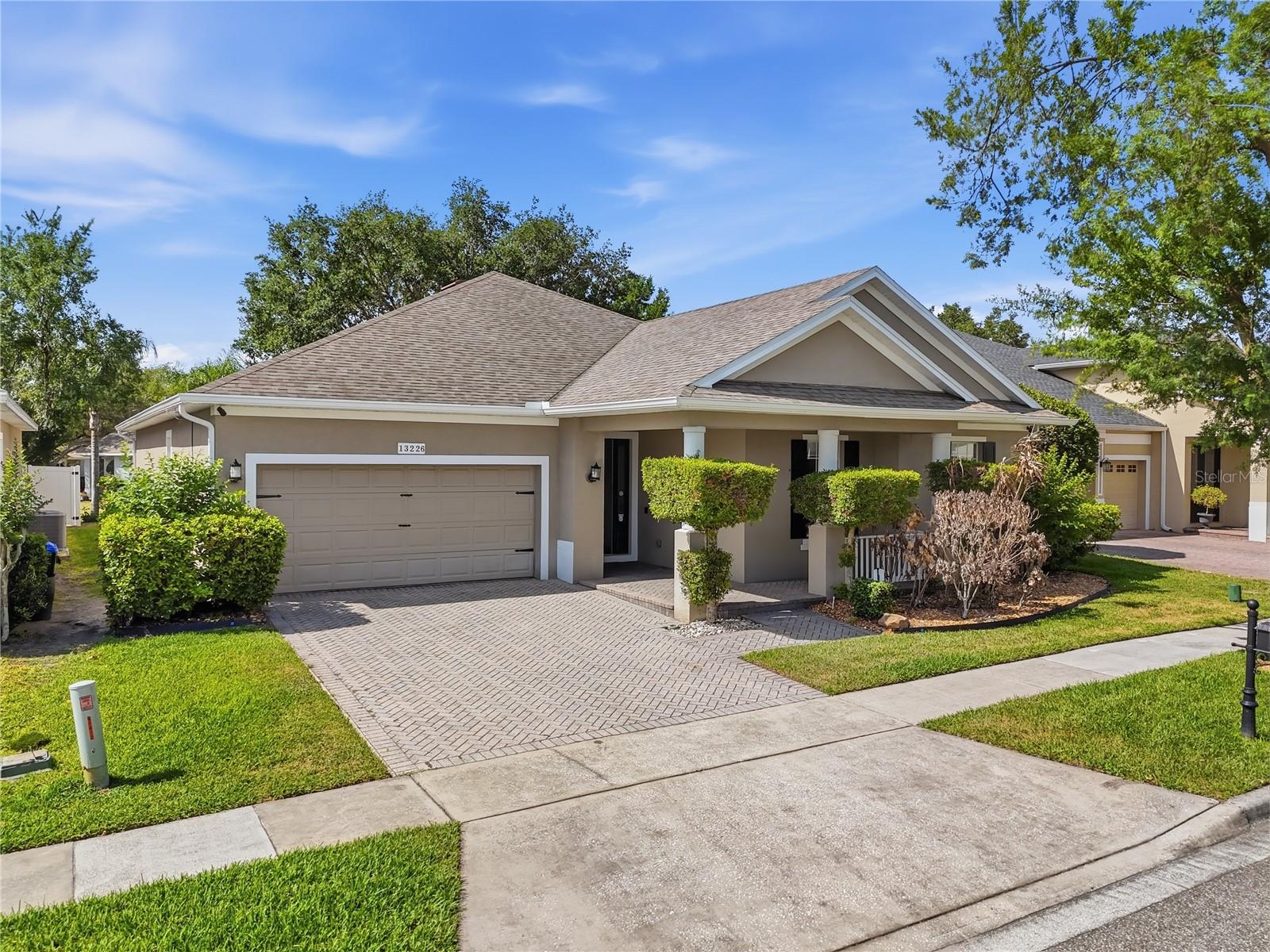 WELCOME to this STUNNING, BEAUTIFULLY UPDATED, MOVE-IN READY home in one of Windermere’s most desirable locations! From the moment you arrive, this exceptional property captures your attention with its BRICK-PAVED DRIVEWAY, CHARMING FRONT PORCH, BEAUTIFULLY ENHANCED FRONT AND BACK LANDSCAPING, and RAIN GUTTERS, offering outstanding curb appeal and a warm first impression.
Boasting over 2,521 square feet of living space, this spacious home features 4 BEDROOMS, 2 BATHROOMS, a 2-CAR GARAGE, and a thoughtfully designed open layout that is perfect for both comfortable everyday living and effortless entertaining. Inside, you will find TILE FLOORING THROUGHOUT, SOARING 8-FOOT DOORS, ARCHED WALKWAYS, CROWN MOLDING, UPGRADED LIGHT FIXTURES, and RECESSED LIGHTING THROUGHOUT THE HOUSE, creating a bright, elegant, and inviting atmosphere.
This home has been tastefully refreshed with FRESH INTERIOR PAINT THROUGHOUT, and the KITCHEN CABINETS HAVE BEEN RE-SURFACED AND PAINTED, giving the entire home a clean, stylish, and modern feel. The kitchen opens seamlessly to the family room and breakfast nook, making it the perfect central space for gathering, relaxing, and entertaining.
Additional highlights include STAINLESS STEEL APPLIANCES, CEILING FANS, BUILT-IN SURROUND SOUND, EXTERIOR SPOTLIGHTS, CAMERA SECURITY SYSTEM, and an EV CHARGING PORT INSTALLED, adding both comfort and modern convenience.
Major value-added improvements include a RE-ROOF COMPLETED IN SEPTEMBER 2020, SPRAY FOAM ATTIC INSULATION for enhanced energy efficiency, and a HIGH-QUALITY HVAC SYSTEM INSTALLED IN OCTOBER 2017, offering lasting comfort and peace of mind.
The oversized PRIMARY SUITE serves as a private retreat, complete with a cozy sitting area, CEILING MOLDING, and sliding glass door access to the SCREENED LANAI. The spacious primary bathroom features a GARDEN TUB, WALK-IN SHOWER WITH FRAMELESS GLASS DOOR, DUAL VANITIES, and a LARGE WALK-IN CLOSET.
Step outside and enjoy the SCREENED LANAI and spacious backyard, ideal for relaxing, entertaining, or simply enjoying the Florida lifestyle. The community also offers a RESORT-STYLE POOL and TOT LOT for residents to enjoy.
Perfectly located just minutes from top-rated schools, Windermere Preparatory, Windermere High School, Publix, Aldi, shopping, dining, Winter Garden Village, the 429 Expressway, Butler Chain of Lakes, and world-famous theme parks, this home offers the perfect blend of LOCATION, STYLE, and VALUE.
A rare opportunity to own a BEAUTIFULLY UPDATED home in Windermere that truly stands out. Schedule your private showing today!
3D TOUR AND FLOOR PLAN LINK ABOVE.