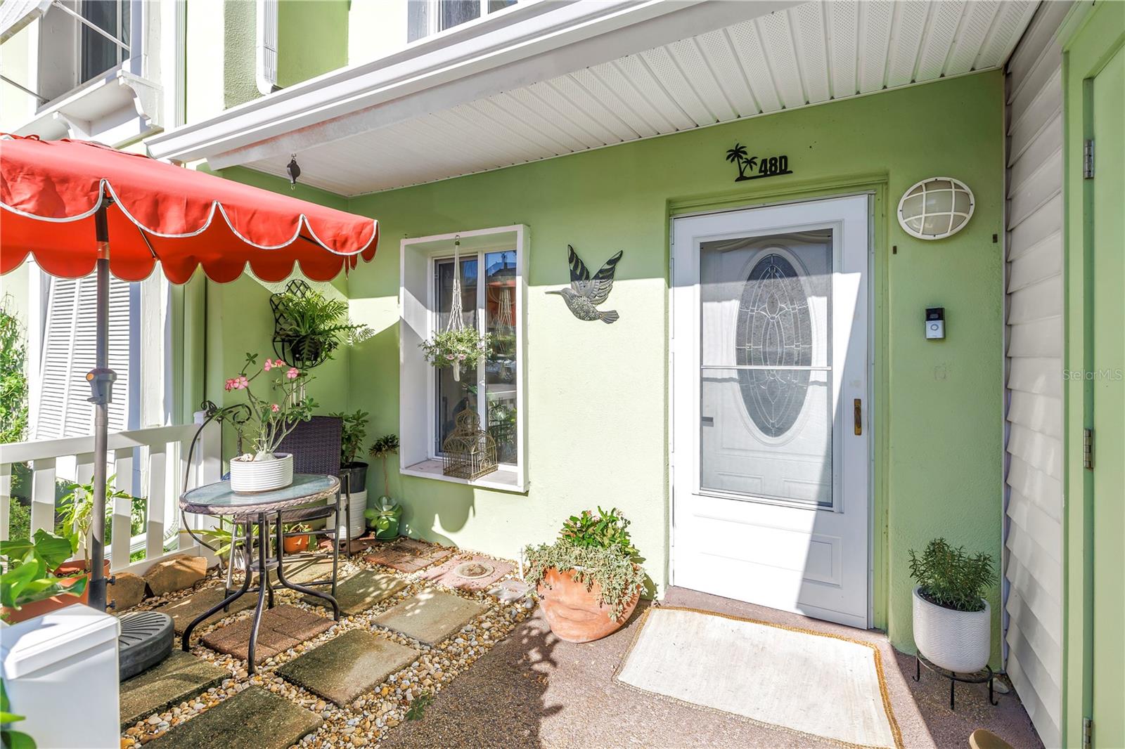 Welcome to Bermuda Bay Beach & Racquet Club — where every day feels a little more like vacation and a little less like reality. Tucked quietly in the heart of this gated waterfront paradise, this charming 2-bedroom, 2.5-bath townhouse offers 1,280 square feet of comfort, character, storage galore, and the kind of laid-back Florida lifestyle everyone chases.

Let’s start with the rare stuff… because Bermuda Bay residents know: storage is basically waterfront gold. This floor plan is famous for its smart use of space and endless storage options, including a huge double-length walk-in closet in the primary suite, oversized guest room walk-in closet, under-stair storage, oversized pantry, attic access, and even an outdoor storage closet for beach gear, bikes, holiday decorations, or that paddleboard you swear you’re going to use every weekend.

The layout is warm, comfortable, and move-in ready, with ceramic tile downstairs, hardwood flooring upstairs, newer windows, in-unit laundry, and room to personalize and update at your own pace — already priced accordingly so you can add your own style without paying for someone else’s questionable design choices from 2007.

One of the standout features? The gorgeous, brand-new screened lanai completed last year with nearly $9,000 invested, creating the perfect private outdoor retreat surrounded by lush greenery and peaceful landscaping. Morning coffee, evening wine, lazy Sunday naps… this is the spot.

Upstairs, the spacious primary suite features an updated vanity area, large corner walk-in shower with glass surround, and a built-in dressing/makeup area that feels delightfully tucked away from the world. Some furnishings are negotiable, making your move even easier.

And then there’s Bermuda Bay itself — one of St. Petersburg’s best-kept hidden gems. Residents enjoy a private beach on Boca Ciega Bay with sunset views that honestly make you stop mid-sentence, two sparkling pools, a hot tub, tennis & racquet courts, clubhouse, kayak storage, shuffleboard, beautifully maintained grounds, and a private gated connection directly to the Pinellas Trail for biking, jogging, dog walks, or nature-filled strolls through nearby bird sanctuary areas.

Despite feeling worlds away, you’re just minutes to Gulfport, downtown St. Pete, beaches, restaurants, nightlife, shopping, and easy highway access for commuting or airport runs.

This is the sweet spot buyers wait for: private, peaceful, affordable waterfront community living with room to make it your own. Whether you’re looking for a full-time residence, seasonal escape, or investment opportunity, this Bermuda Bay townhouse delivers the Florida lifestyle with comfort, charm, and just enough tropical magic to make your friends jealous.