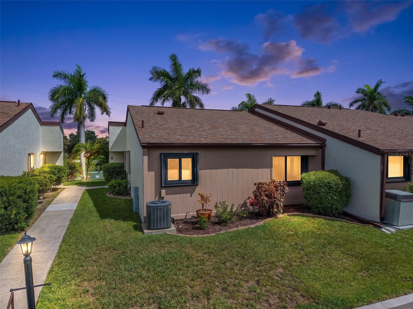 ADORABLE condominium located within the heart of Punta Gorda!!!  This MOVE IN READY and affordable unit will make the perfect year round, seasonal or investment residence.  UPGRADES include:  HURRICANE IMPACT windows and doors PLUS hurricane shutters by High Wind Shutters providing additional protection; INTERIOR REMODEL in 2021 including the kitchen, partial bathroom and all flooring (carpets replaced 2022); A/C 2018' Electrical panel 2022; Patio concrete installation 2021.  Association replaced the ROOF 2018.   This friendly complex has a HUGE heated pool and a recently renovated clubhouse.   The land up to W. Olympia is Association owned and as such, provides privacy and a park-like setting.  LOW CONDO FEES OF $450 PER MONTH.  Your new condo is situated withing walking or biking distance to Downtown Punta Gorda, the History Park, Isles Civic Center, Fishermen's Village, Visual Arts Center, Military History Museum, Dog Park, Tennis & Pickle Ball Courts, Farmer’s Markets, and live entertainment.  There are amazing sunsets across the street on Charlotte Harbor.  Several Gulf beaches are approximately 45 minutes away.   Sunseeker Resort is just 2 miles away. GREAT OPTIONS FOR ENTERTAINMENT AND FIRST CLASS DINING. NO FLOODING/HURRICANE damage to this unit during the 2024 storms.  This home checks off every box on your wish list.  Make an appointment TODAY to see this adorable and affordable residence.  Condo being sold PARTIALLY FURNISHED.
