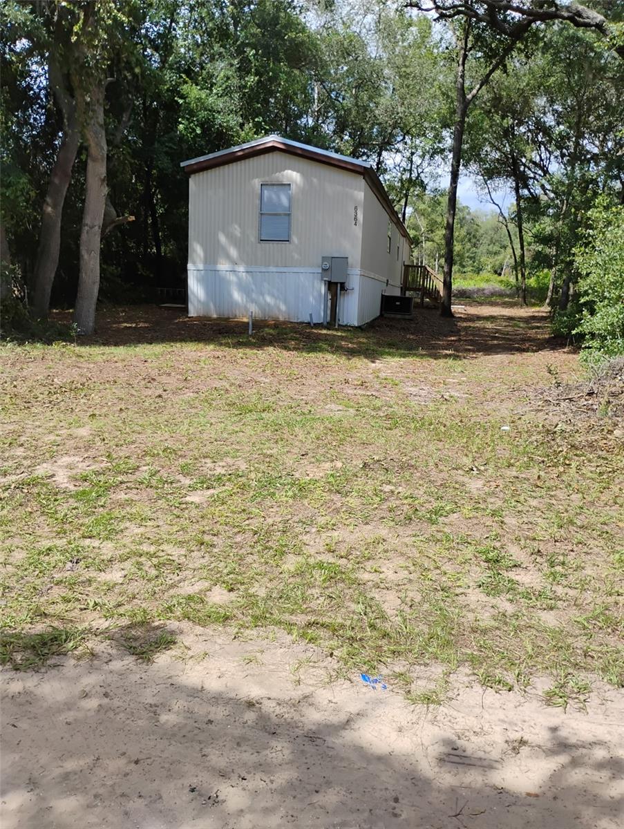Charming 2-Bed, 2-Bath Manufactured Home on a Spacious Lot! Are YOU looking for a cozy yet modern place to call home? This beautifully updated 2-bedroom, 2-bathroom manufactured home sits on a freshly renovated .34-acre lot, offering plenty of space to enjoy. Recent upgrades include a brand-new septic system, gorgeous granite countertops, and brand-new appliances—giving you peace of mind and a stylish kitchen to cook in! Whether you're sipping coffee on the porch or making memories in your updated space, this home is move-in ready and waiting for you. Don’t miss out—schedule a showing today