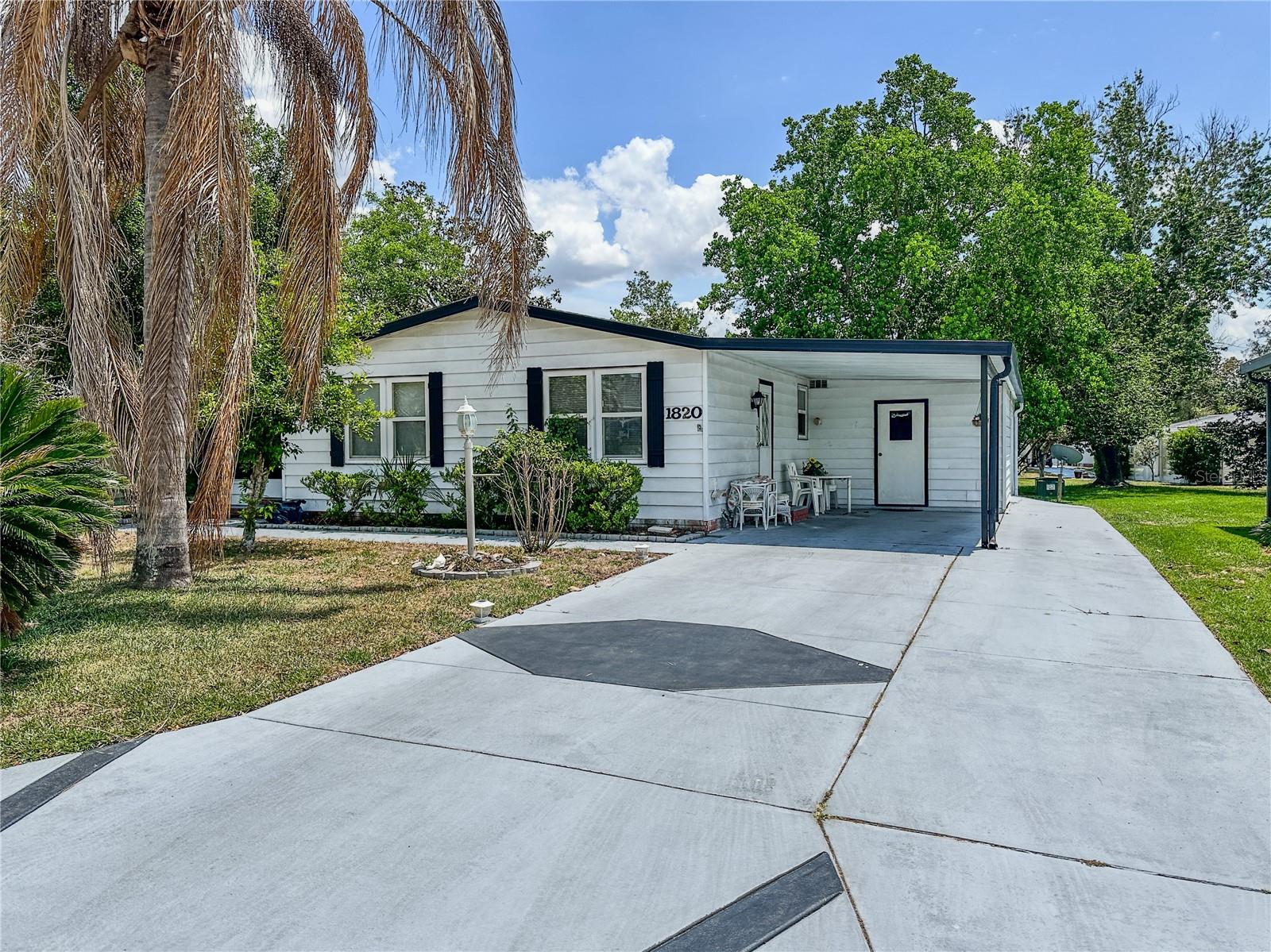 2-bedroom, 2-bath home located in the County Club Hills in Lady Lake! This property offers a functional layout and a great opportunity to update and make it your own at your own pace. Enjoy the added bonus of a large workshop, perfect for hobbies, storage, or extra space to fit your needs. Conveniently located near shopping, dining, and The Villages, you'll love the easy access to everyday essentials and entertainment. A great chance to create a space that truly fits your lifestyle!