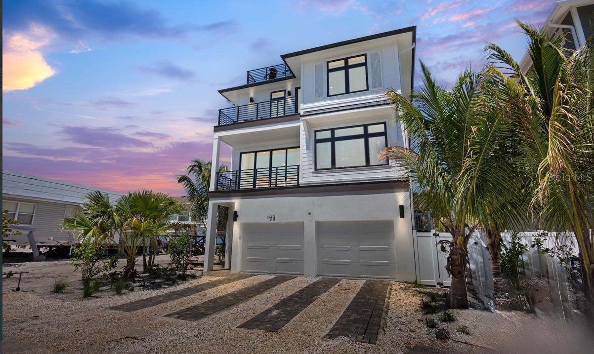 INCREDIBLE GULF VIEWS IN THIS NEW CONSTRUCTION HOME! Where sunrises meet sunsets, this Bradenton Beach estate offers the ultimate blend of luxury and comfort. This extraordinary seven bedroom, seven and a half bathroom estate is the ultimate in luxury coastal living. Perfectly designed for both entertaining and relaxation, the home combines elegant modern design with the laid-back charm of Anna Maria Island. Just steps from the sugar-white sands and turquoise waters of the Gulf of Mexico, the property delivers a lifestyle of comfort, beauty, and convenience.



Inside, the open-concept layout features expansive living areas with floor-to-ceiling windows that flood the rooms with natural light and frame breathtaking views of the water. The gourmet kitchen is a true centerpiece, complete with a massive center island, quartz countertops, high-end appliances, and generous seating for family and guests. Designer touches, coastal-inspired décor, and seamless indoor-outdoor transitions create an inviting and serene atmosphere throughout the home. Each of the seven bedrooms includes its own en-suite bath, offering privacy and comfort. A custom bunk room adds a playful yet practical touch, making the residence ideal for hosting large families or groups.



Outdoors, a private heated pool and spa are surrounded by lush landscaping and a shaded lounge area, creating a resort-like retreat perfect for relaxing or entertaining. The rooftop deck is the crown jewel of the home, providing panoramic views of both the Gulf and the Intracoastal Waterway. This rooftop oasis offers a spectacular setting for morning coffee, evening cocktails, or simply soaking in the island’s natural beauty.



Located on the sought-after barrier island of Anna Maria, this estate places you within walking distance of charming local shops, beachfront dining, and island entertainment. The area is known for its pristine beaches, boating, fishing, paddleboarding, and the welcoming small-town feel that makes Bradenton Beach so special, while still being within easy reach of Sarasota and Tampa for additional cultural and city conveniences.



Whether you are seeking a private family retreat, a luxury vacation rental, or a forever home by the sea, this Bradenton Beach estate offers an unparalleled opportunity to embrace the best of Florida’s Gulf Coast lifestyle.