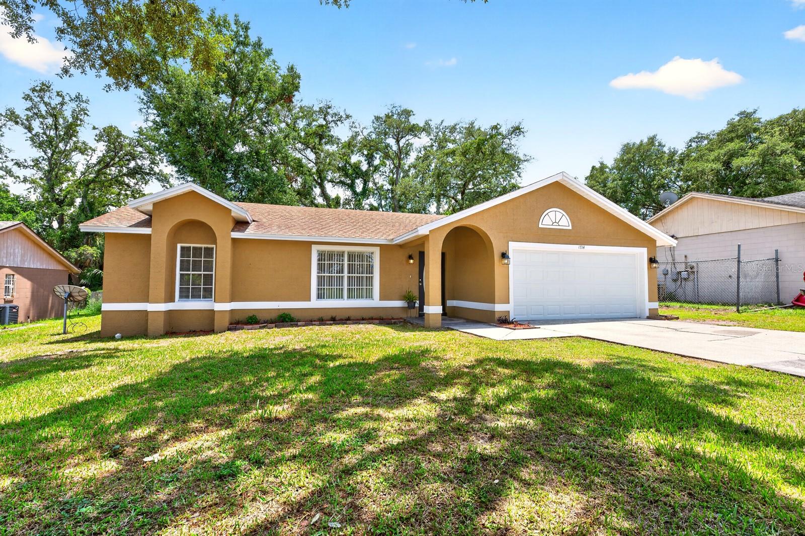 Virtually Staged. Seller will review all of the offers on or before July-10-2026 | Completely REMODLED and filled with MODERN FINISHES, this beautifully updated 3-bedroom, 2-bath home in Orlando's Walnut Creek community offers the fresh feel of a new home – and best of all, NO HOA! Major updates have already been completed, including a ***BRAND NEW A/C (2026), NEW WATER HEATER (2026), NEWER ROOF (2021), FRESH INTERIOR & EXTERIOR PAINT, a FULLY UPDATED KITCHEN, thoughtfully UPDATED BATHROOMS, new lighting, ceiling fans, and more, making this a truly MOVE-IN READY opportunity. Inside, CERAMIC TILE FLOORING flows throughout the entire home for a clean, cohesive look that is low maintenance. The heart of the home is the brand-new kitchen, tastefully designed with solid surface countertops, abundant cabinetry, breakfast bar, NEW STAINLESS STEEL APPLIANCES, and a cozy breakfast nook. The kitchen opens to a light filled family room, creating an easy flow for everyday living, or entertain in the formal living and dining spaces. The spacious PRIMARY SUITE features a renovated private bath, while two additional bedrooms share an equally updated second bathroom. A generously sized LAUNDRY ROOM adds extra functionality, and the attached 2-CAR GARAGE provides plenty of room for parking and additional storage. Situated on a generous .20 ACRE ~ CUL-DE-SAC LOT, you will enjoy the extra space while remaining close to everything Orlando has to offer. Located just minutes from H Mart, Orlando's Chinatown, shopping, local markets, and an incredible variety of authentic restaurants, you will also appreciate easy access to Walt Disney World, Universal Orlando Resort, SeaWorld, major highways, and countless Central Florida attractions. If you have been searching for a completely updated home with modern finishes, no HOA, and an unbeatable Orlando location, this Walnut Creek gem is ready to WELCOME YOU HOME!