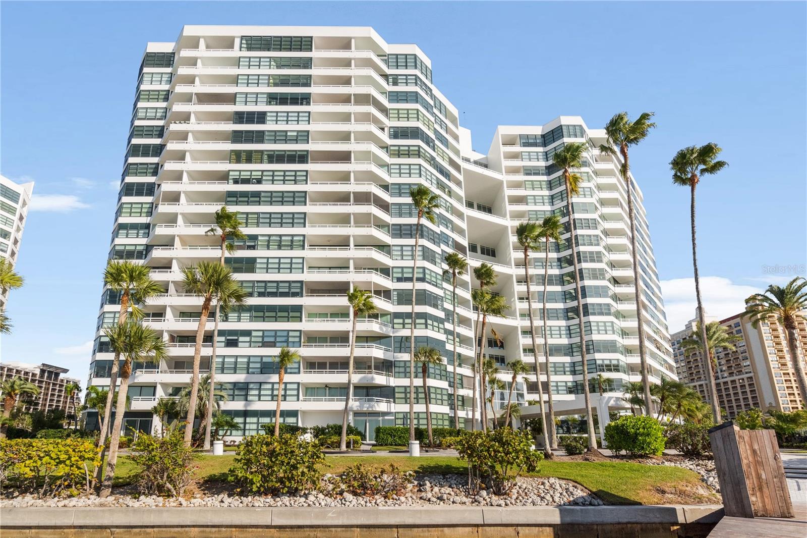 Welcome to Residence 1205 at Condo on the Bay, one of Sarasota’s most iconic waterfront addresses. Perched high above the shoreline, this elegant 2-bedroom, 2-bath residence offers approximately 1,729 sq ft of refined living with panoramic, unobstructed views of Sarasota Bay that transform daily living into a private waterfront experience.
From the moment you enter, the sweeping vistas pull you in, shimmering open water, sailboats gliding by, and postcard sunsets that fill the sky. High-rise living here is more than beautiful; it’s effortless. The layout is designed to maximize light, space, and the breathtaking scenery, with a generous balcony that feels like an outdoor living room suspended over the bay.
Inside, the home delivers the level of comfort and sophistication expected of a premier bayfront building. Expansive living and dining spaces flow seamlessly, perfect for relaxation or hosting. The private bedroom suites offer their own spectacular perspectives, creating daily moments of calm and inspiration. Whether you’re a year-round resident or seasonal homeowner, this floor and view line remains one of the most sought-after in the entire tower.
Life at Condo on the Bay is world-class. The community is renowned for its resort-style amenities, including two heated pools, tennis, a state-of-the-art fitness center, boat docks, 24-hour security, covered parking, and impeccably maintained grounds surrounded by lush tropical landscaping. Step outside and you’re moments from downtown Sarasota, the Van Wezel Performing Arts Hall, The Bay Park, waterfront dining, shopping, galleries, and cultural venues that make this one of the most desirable urban coastal destinations in Florida.
The building maintains strong reserves, attentive management, and a prestigious reputation, contributing to consistently strong resale value. With similar high-floor bayfront residences selling quickly in the $1.3–$2.1 million range, opportunities like this are limited.
For those seeking a lock-and-leave luxury retreat with one of the best views in Sarasota, this residence offers unmatched appeal.
For those seeking long-term ownership in an irreplaceable waterfront location, this is the moment.
Bayfront properties of this caliber rarely come to market and when they do, they move fast.
 Secure your private showing today and experience why Condo on the Bay remains one of Sarasota’s most coveted addresses.