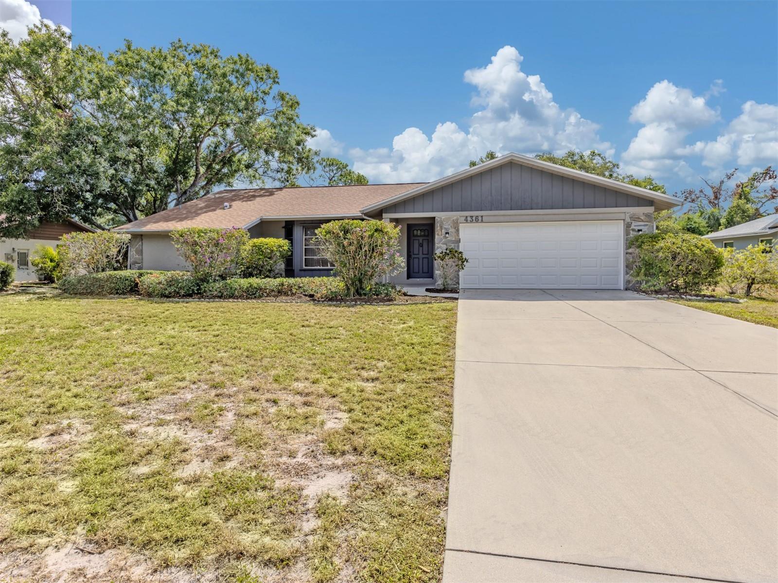 Nestled on a quiet cul-de-sac in the desirable Whispering Woods community, this spacious 4-bedroom, 2-bath pool home offers 2,225 square feet of comfortable living with no HOA fees and not located in a flood zone. The thoughtfully designed split floor plan features an updated kitchen and bathrooms, multiple living and dining areas, and abundant natural light throughout. A roof installed approximately eight years ago provides added peace of mind. Step outside to the screened lanai and private pool, creating the perfect space for relaxing or entertaining while enjoying the peaceful surroundings. Situated on an oversized, maturely landscaped lot, the property offers exceptional privacy and plenty of room to spread out. An attached garage and extended driveway provide ample parking. Ideally located just minutes from Siesta Key, downtown Sarasota, shopping, dining, I-75, and top-rated schools, this home offers the perfect blend of privacy, space, and convenience. Schedule your private showing today!