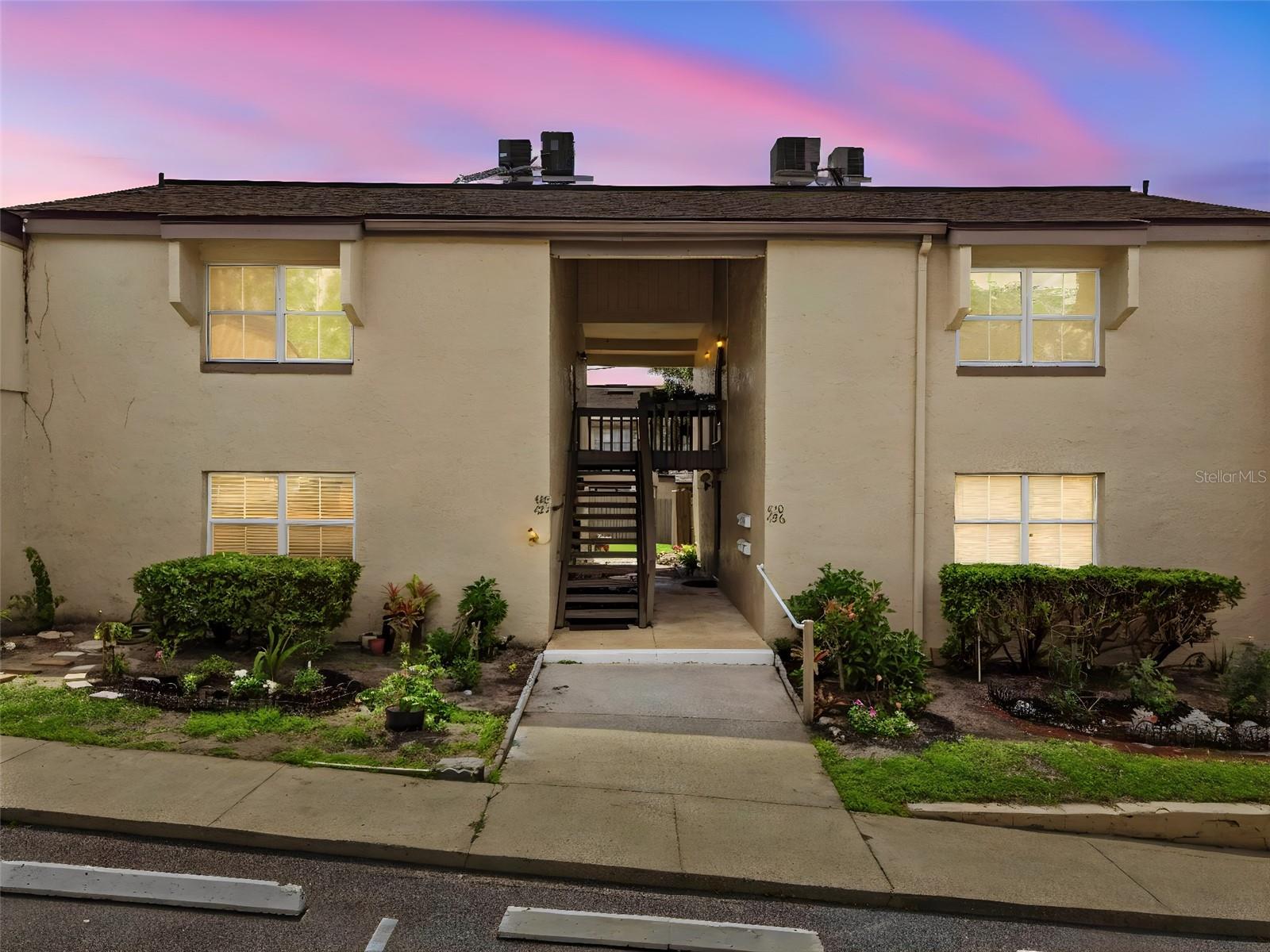 Welcome to easy, peaceful living in the heart of Central Florida! Step inside to discover a completely remodeled beautifully maintained first-floor 1-bedroom, 1-bath condominium featuring elegant stone countertops, modern soft-close cabinetry, stylish tile flooring throughout, and a brand-new water heater and freshly painted. This move-in-ready home also includes the added convenience of an upgraded in-unit washer and dryer combo. Enjoy your own private fenced patio. The perfect space to relax. Located within a desirable 55+ community, residents enjoy access to a community pool and clubhouse designed for comfort, connection, and leisure. The HOA fee includes water, sewer, cable, internet, pest control, exterior maintenance, and insurance, allowing for truly low-maintenance living and peace of mind. The location is unbeatable convenience with shopping malls, supermarkets, restaurants, recreational parks, hospitals, and major attractions just minutes away. Whether you are looking to downsize, retire in comfort, or simply enjoy a more relaxed lifestyle, this charming condo offers everything you need to live the peaceful life you deserve.