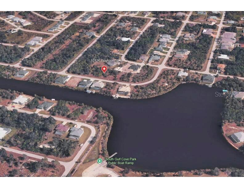 Great location in the desirable South Gulf Cove Subdivision.  Nice high and dry lot adjacent to new waterfront homes.  Water, Sewer and power on paved road.  Back yard has excellent privacy with oak trees on back of lot, and oversized lot on neighbor to rear.  South Gulf Cove Community Boat ramp/Park is super convenient.
