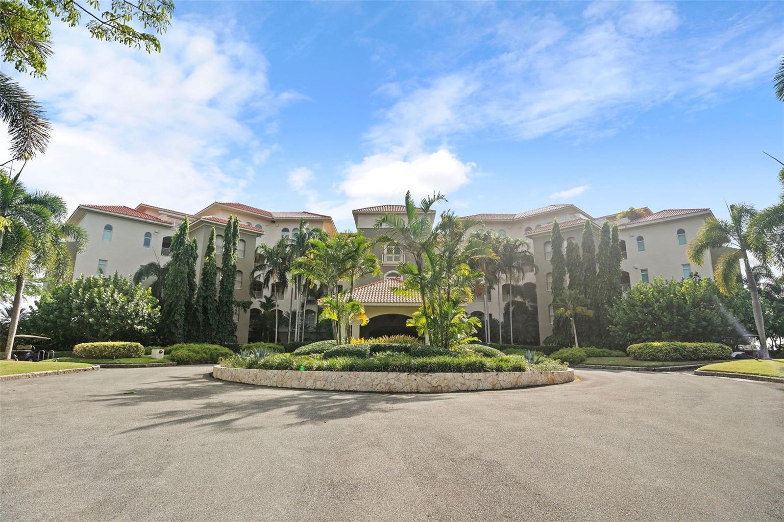 One or more photo(s) has been virtually staged. Discover unparalleled elegance in this exquisite ground-floor Plantation Village condo unit, offering 2,120.80 sq. ft. of thoughtfully designed living space. Enjoy breathtaking mountain, lake, and golf course views from the expansive 786 sq. ft. open patio and terrace—perfect for indoor-outdoor living.

This condo features three luxurious ensuite bedrooms, each with a spacious walk-in closet and bathtub, along with a convenient powder room and a laundry area in the hallway. The open-concept kitchen, dining, and living areas create an inviting ambiance, ideal for entertaining or relaxing. The kitchen is fully equipped and perfect for creating great dishes with spacious countertops.

Additional highlights include:

One designated parking space
Two-car underground garage
One underground golf cart parking space with a golf cart included
One underground storage unit for extra convenience
This prime location offers an exceptional lifestyle with unmatched views and proximity to world-class amenities. With an active club membership, come and enjoy access to premier amenities. 

Don’t miss this rare opportunity—schedule a private tour today!