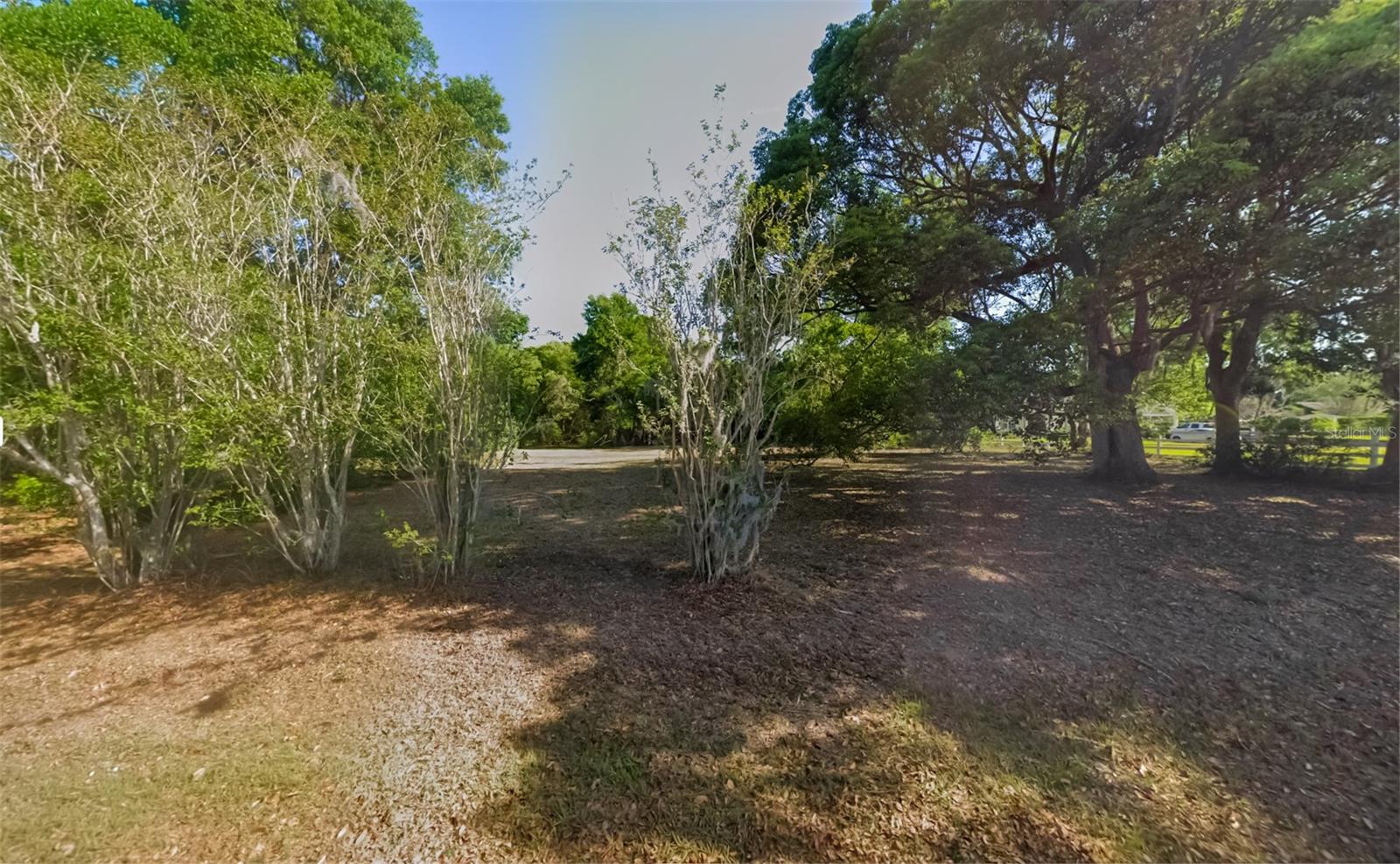 Wood and private 2.5 acres, close to all amenities, but secluded as well. Build your custom home on this private parcel.