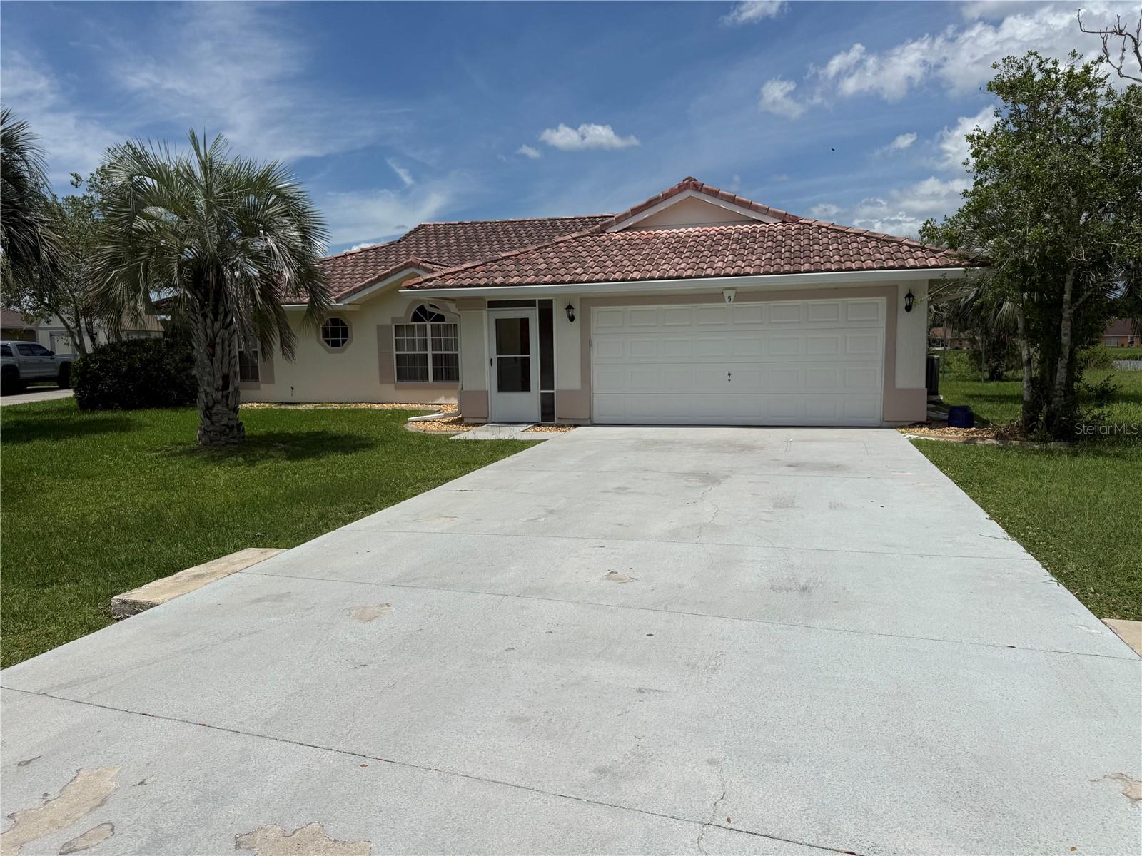 Waterfront living meets unmatched value in this beautifully updated, move-in-ready 1,736 sq ft, Ocala home! With NO HOA fees or restrictions, this residence is packed with premium upgrades that meet true freedom and ultimate peace of mind. This 3-bedroom, 2-bathroom, 2-car garage home is situated on a serene waterfront lot complete with mature palm trees and backyard fishing. The exterior features a highly durable tiled barrel roof designed for a 50-to-100-year lifespan. Inside, you will find a freshly painted interior, sparkling granite countertops in both the kitchen and bathrooms, and stainless steel appliances. The family room opens up through a sliding door into a closed-in porch with windows, perfect for enjoying the views. Major mechanical upgrades include a 5-year-old Rheem HVAC system, a 4-year-old upgraded Electrical panel, and a brand-new 2026 Water heater. Best of all, the property includes a 1-year home warranty! Perfectly located near the World Equestrian Center, Silver Springs State Park, the Silver River Museum & Environmental Education Center, and the Silver Springs Forest Conservation Area, you are minutes away from world-class entertainment and natural beauty. This pristine property is an unbeatable value at $310,000 and will not last—schedule your showing today!