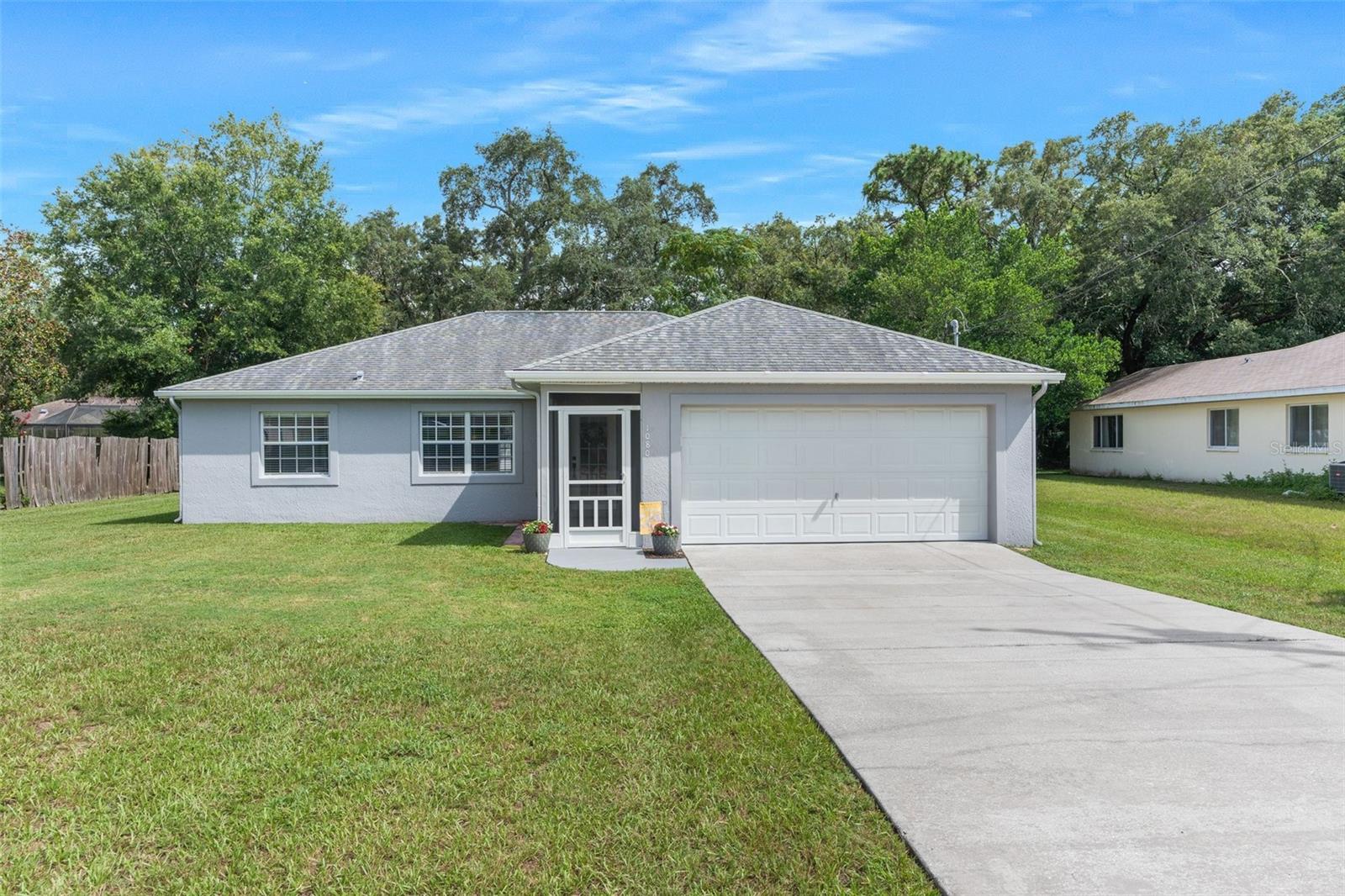 Back on Market Due to a Buyer family emergency. This home has past the Home Inspection, we have a Clean 4 Point, we have a Clean Appraisal, and the New Roof has now been completed. NO HOA, NO CDD, NO FLOOD zone located on a quiet street with no through traffic!!! New AC, New high end scratch resistant Luxury Vinyl Plank water proof with underlayment and cork backing flooring, New Carpet in bedrooms, New four inch baseboards, All New door hardware, New Hunter Douglas Fans, Newer lighting throughout the home, and Freshly painted inside including ceiling and outside freshly pressure washed! Newer Shower, Newer Toilette's, Newer Faucets, Newer Faux Wood Blinds, The Garage door was replaced a year ago.  Front screened in vestibule will keep unwanted pests out while allowing fresh air in! This home is move in ready! Kitchen comes with Stainless steal refrigerator, dishwasher, stove, Large Pantry, and a Tall Kitchen bar! There is a Full size Laundry room, Finished garage and the garage also has a side door and a newer silent garage door opener.  The home is a split floor plan with two bedrooms on the other side of the living room. Home has TALL Vaulted ceilings, LARGE Back yard big enough to install a pool for those hot summer months! The back screened in porch (12x20) has a double pane insulated roof to keep you cool while you sit outside! Oversize lot with plenty of room for a boat or RV storage. Driveway is long enough for Six cars!!! Seller Has Survey and home Book of records for new owner. There is an actual walk through video attached, click on virtual tour button. Floor plan is available.  Located in the heart of Spring Hill close to Weeki Wachee Springs, Pine Island Beach, Public Boat Ramps that go out to the Gulf of Mexico, Public Golf Courses, Public Parks, Hiking trails, biking trails, Restaurants, Hospitals, Doctor Offices, banks, Shopping centers, and the outlet malls are only 45 minutes away!