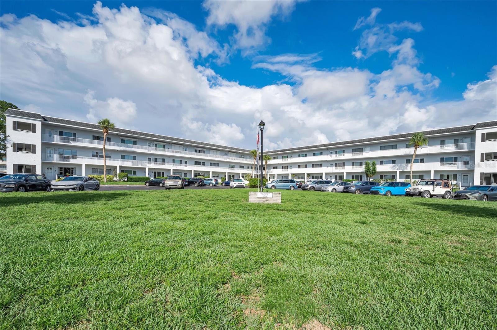 Welcome to this beautifully maintained 2-bedroom, 2-bath CORNER unit located in the highly sought-after On Top of the World, one of Clearwater's premier active 55+ communities. Conveniently situated in the first building as you enter the community, this spacious residence offers approximately 1,400 heated square feet of comfortable living space and comes fully furnished, making it truly move-in ready. The thoughtfully designed floor plan features a bright and airy living area, a spacious family room, and a kitchen with a dedicated dining space perfect for everyday living or entertaining guests. You'll appreciate the abundance of storage throughout the home, providing plenty of room for seasonal items, hobbies, and personal belongings. Recent updates include Simonton impact-resistant windows, enhancing energy efficiency, comfort, and peace of mind. The corner-unit location allows for additional natural light, creating a warm and inviting atmosphere throughout the home. Residents of On Top of the World enjoy an exceptional lifestyle with world-class amenities including golf courses, swimming pools, fitness centers, pickleball, tennis, walking trails, clubs, social activities, and more. Centrally located in Clearwater, you're just minutes from award-winning Gulf beaches, shopping, dining, medical facilities, airports, and entertainment. Whether you're looking for a full-time residence or a seasonal Florida retreat, this furnished corner unit offers the perfect combination of comfort, convenience, and an active resort-style lifestyle. Schedule your private showing today and discover why so many choose to call On Top of the World home.