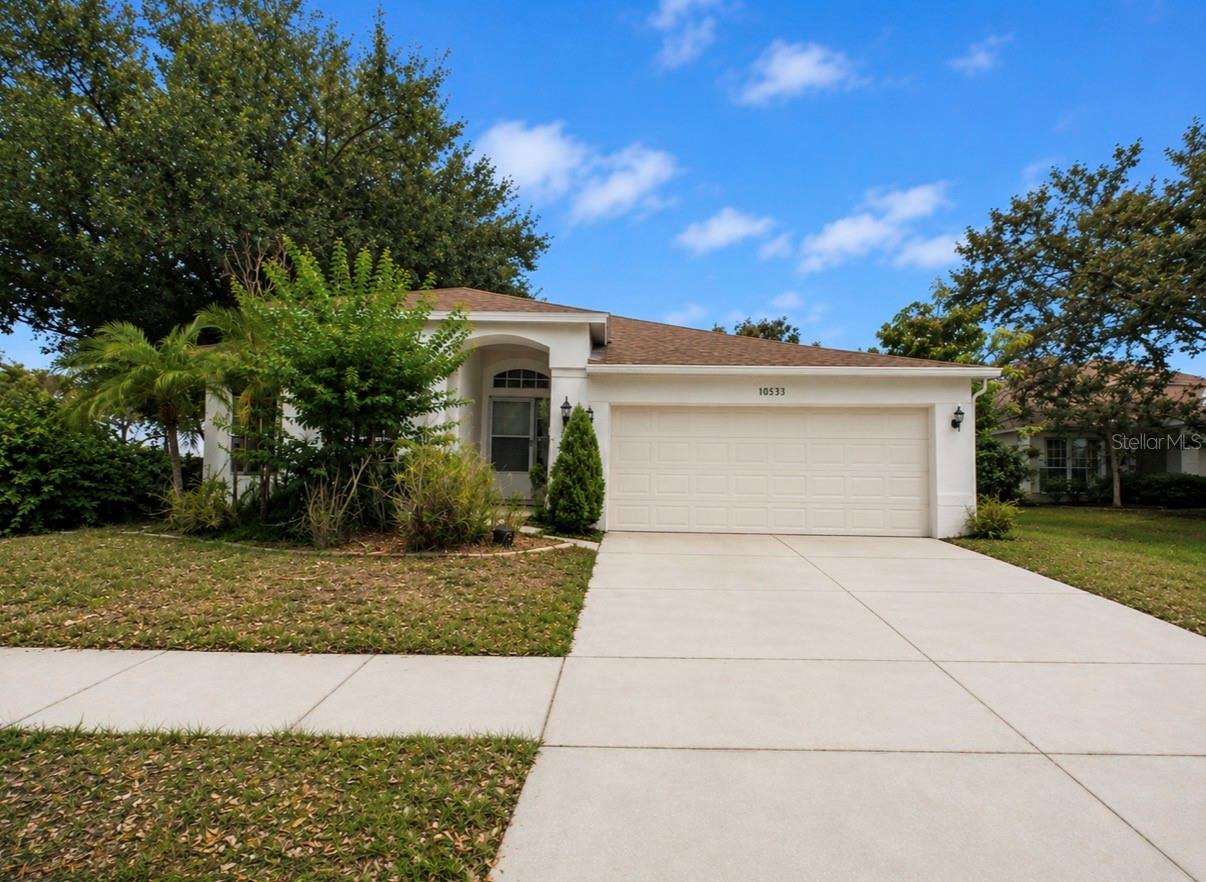 Welcome to 10553 Egret Haven Lane, a beautifully maintained 3-bedroom, 2-bathroom home located in the highly desirable South Pointe community of Riverview. Freshly painted throughout and featuring durable luxury vinyl plank flooring, this home offers a clean, modern feel with easy maintenance and no carpet to worry about. Step outside and enjoy Florida living at its finest from the spacious screened-in porch, the perfect spot for morning coffee, evening relaxation, or entertaining family and friends year-round. The backyard is a gardener's dream, boasting mature mango, avocado, and banana trees that provide both beauty and seasonal fruit right at your doorstep. Located in the popular South Pointe subdivision, residents enjoy access to fantastic community amenities including a swimming pool, multiple playgrounds, parks, basketball courts, walking areas, and recreational spaces for all ages. The neighborhood is conveniently located near shopping, restaurants, schools, I-75, US-301, and offers an easy commute to downtown Tampa, MacDill Air Force Base, and Tampa International Airport. Whether you're looking for a peaceful place to unwind or a community filled with amenities and convenience, this home offers the perfect combination of comfort, location, and Florida lifestyle. Schedule your showing today and come see why South Pointe continues to be one of Riverview's most sought-after communities.