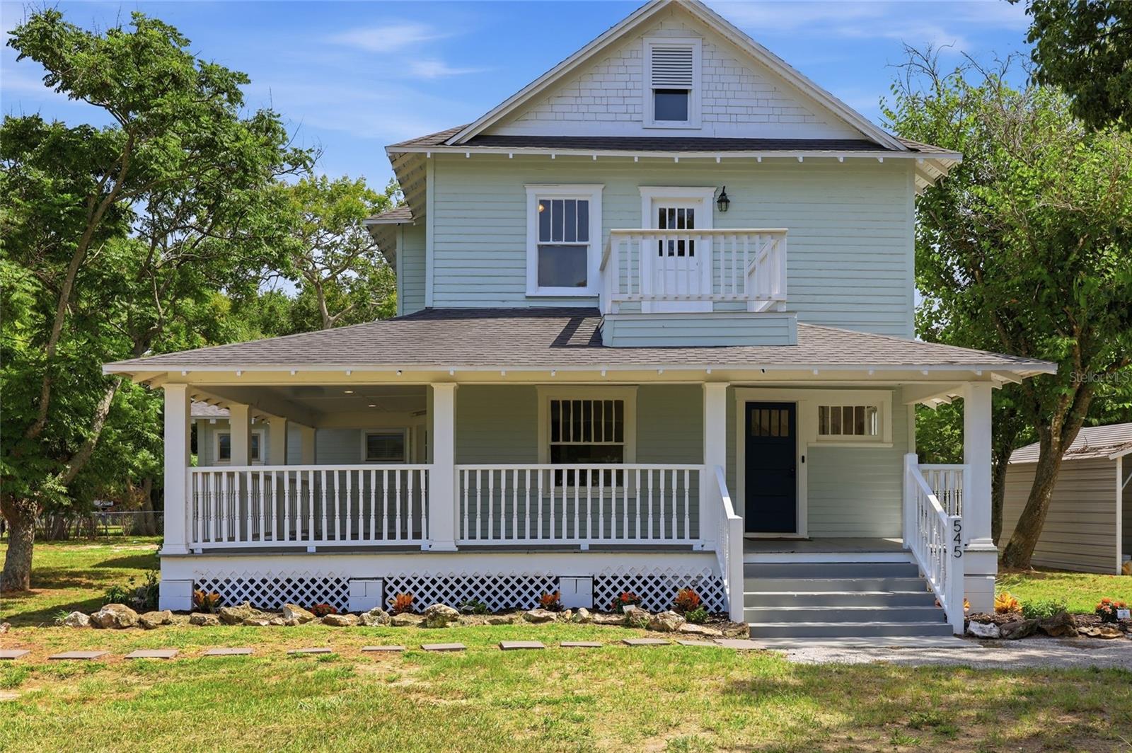 Old-school charm + modern peace of mind. Every major system is already taken care of, featuring a brand-new roof (2020), all-new A/C units, updated electrical, and brand-new stainless steel appliances, and fresh exterior paint in 2025

The main floor includes a sweeping wrap-around front porch, separate formal living and dining areas, soaring high ceilings, French doors, and a double-sided fireplace. The massive open kitchen serves as the heart of the home, fully equipped with a large central island, granite countertops, and ample storage space.

The layout offers four bedrooms and 2.5 bathrooms. The sprawling master suite includes a private en suite, a large walk-in closet, and an attached bonus room perfect for a home office or a nursery. A dedicated indoor laundry room adds extra daily convenience.

Outside, the property sits on a rare, fully fenced 1-acre yard shaded by absolutely gorgeous trees. Location is a major bonus here, as you are just a few minutes' walk from neighborhood parks, beautiful local lakes, and the public boat ramp on Lake Haines for easy days on the water.

This property combines a great lake-life location with completely updated living.