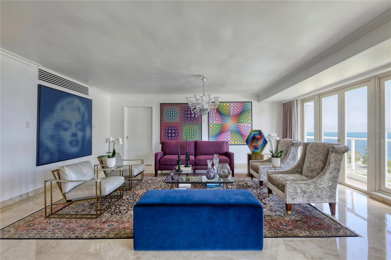 ***SOLD*** One of San Juan’s most esteemed addresses on Ashford Avenue, located directly in front of Ventana del Mar. Ocean views welcome all who enter this full floor residence at Sancti Spiritus Park. The entertaining and living area is situated by the entrance of the home with northern exposure allowing for plenty of natural light. This expansive 4,925 Sq. Ft. apartment with private elevator access has three bedrooms plus home office and private gym with sauna that can be converted into two additional bedrooms, as well as four bathrooms and two powder rooms. The master suite has two envious walk-in closets along with a spacious en-suite bathroom. The kitchen offers a contemporary design with stainless steel appliances. Three covered parking spaces are conveniently provided. Few buildings in Condado Beach match the elegance and convenience that Sancti Spiritus Park affords residents. It is a boutique condominium designed and built by Alavarez-Diaz Villalon architects, offers only 9 floors comprising 12 apartments in total. Amenities abound in the neighborhood with fine dining, shopping, beach and private schools in close proximity. Minutes away from Old San Juan, Miramar and Isla Verde. Monthly HOA: $1,434.24. Hazard Insurance: $8,673.