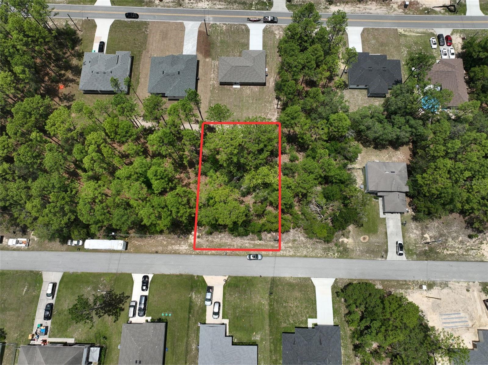 Prime 0.23-acre homesite in desirable Citrus Springs featuring paved road access, city water available, electricity nearby, and surrounded by beautiful new construction homes. Conveniently located near shopping, schools, golf courses, parks, and outdoor recreation, this ready-to-build lot offers an excellent opportunity to construct your dream home in one of Citrus County’s fastest-growing communities with no HOA.