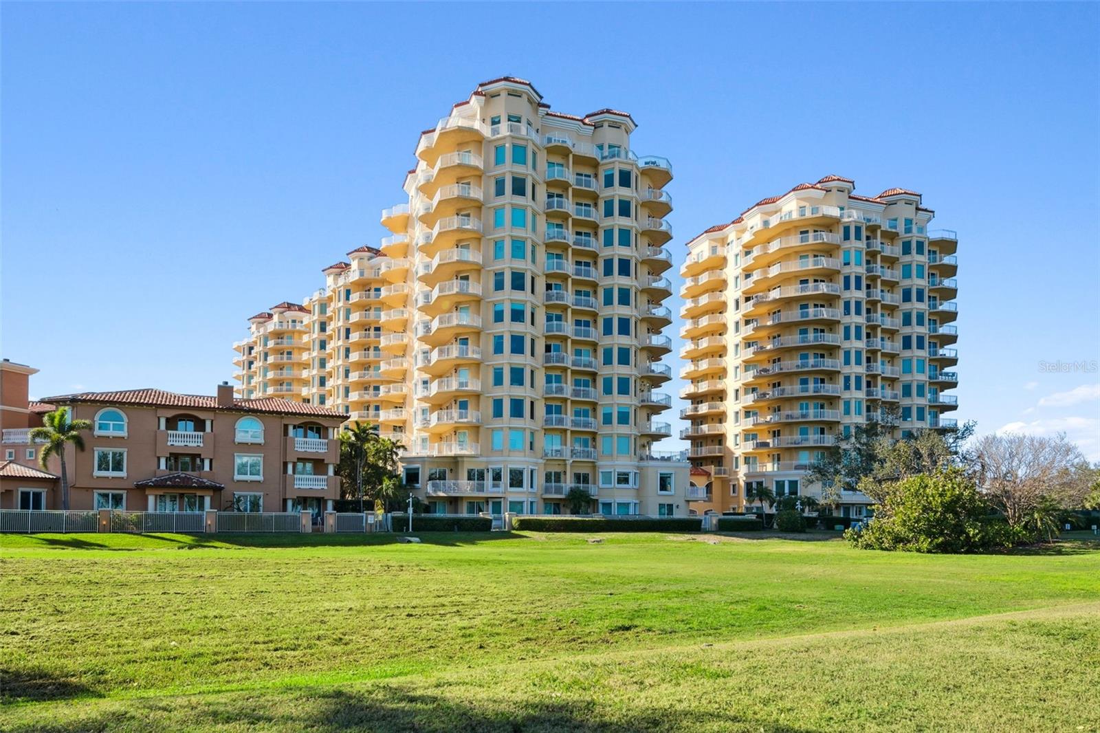 Live above it all in this extraordinary condominium perched on the 7th floor of Vinoy Place in the heart of downtown St. Petersburg. Boasting unparalleled 270-degree waterfront views and a commanding presence just below the penthouse level, this residence is truly a statement piece of real estate. Every room in this 3,600-square-foot home is designed to showcase the breathtaking beauty of its surroundings. From the iconic St. Pete Pier to the striking Sunshine Skyway Bridge, the wide-open waters of Tampa Bay, and the glittering downtown St. Pete skyline, each window frames a unique landmark. Three private balconies provide unobstructed vistas that will never be compromised, thanks to the surrounding protected parks on three sides. Step inside and experience the height of luxury living. This exclusive unit offers secure key-fob access to a private elevator lobby on your floor, ensuring both privacy and exclusivity. The thoughtfully designed floor plan is one of the only with 10ft ceilings and includes three expansive bedrooms, each with waterfront views and en-suite bathrooms, offering comfort and tranquility for you and your guests. The Owner's Suite is a sanctuary, featuring double doors leading to an oversized bedroom with an additional sitting area, walk-in closet, and a lavish primary bathroom with a soaking tub, a spacious walk-in shower, and two separate vanities. Whether you’re hosting or relaxing, this unit combines modern sophistication with effortless living. Vinoy Place is renowned for its exclusivity, elegance, and exceptional amenities. Enjoy a 24/7 manned guardhouse, two heated pools and spas, a state-of-the-art fitness center, a clubhouse, and ample guest parking. Additional conveniences include electric car charging stations, a car wash area, and even shopping carts to easily transport groceries to your residence. This unit comes with two premium parking spaces located just steps from the elevator and a spacious private storage room for all your needs. This exclusive community sets the gold standard for resort-style living in downtown St. Petersburg, nestled among waterfront parks and just a short stroll from world-class dining, shopping, and cultural attractions. Experience a lifestyle that is simply unmatched. This home offers the perfect balance of security, sophistication, and serenity.