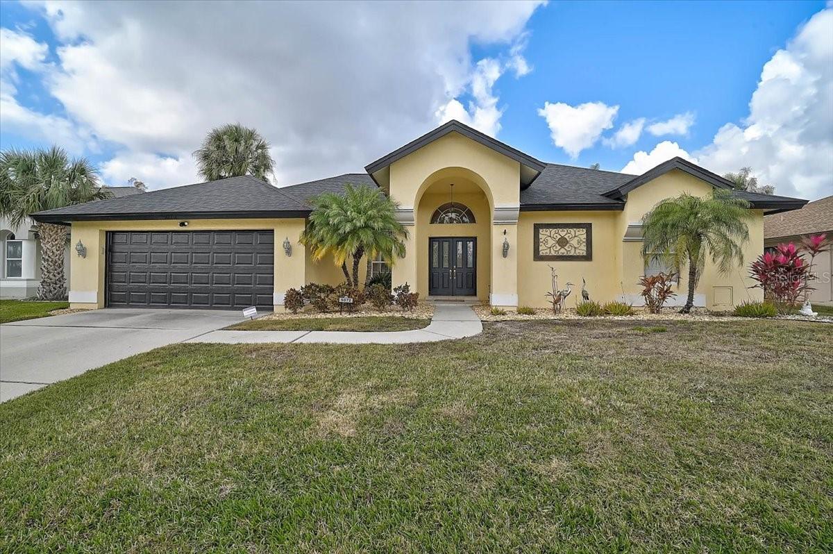 Welcome to your own private retreat on the golf course! This beautiful 4BR/3BA home offers the perfect blend of comfort, space, and versatility — all with a sparkling pool and stunning golf course views right from your backyard. Step inside and you’ll immediately appreciate the open, inviting layout designed for both everyday living and entertaining. The kitchen has been thoughtfully updated with all new appliances (except the dishwasher), offering a fresh and modern feel that makes cooking and gathering effortless. An inside laundry room adds everyday convenience, complete with a washer and dryer that are approximately one year old. The spacious primary suite is a true sanctuary, offering plenty of room to relax and unwind. It features an oversized walk-in closet, dual sinks, a luxurious sunken tub perfect for soaking, and a separate walk-in shower that adds both comfort and functionality to the space. At the back of the home, you’ll find a private 4th bedroom and 3rd bathroom — ideal as a mother-in-law suite, guest quarters, or private office space. Whether hosting extended family or creating a quiet retreat, this flexible layout provides the privacy you need. Recent upgrades include a NEW roof (2024), a NEW 5-ton A/C system, pool pump, and hurricane-rated pool cage screens (2025). The water heater was replaced approximately three years ago, and the fascia boards have been freshly painted. Step outside and enjoy your own backyard oasis. Cool off in the pool, unwind with peaceful golf course views, or entertain friends in a setting that feels like a vacation every day. This home combines thoughtful design, flexible living areas, and scenic surroundings to create an exceptional place to call home. Schedule your  showing today and experience it for yourself! Peridia offers an active lifestyle with an executive 18-hole golf course, tennis, pickleball, heated pool, tiki bar, restaurant & bar, and pro shop. Ideally located, this home is close to shopping, airports, restaurants, and some of the best beaches in Florida, offering both convenience and lifestyle. Additional Fees: $938 quarterly master association fee, $600 annual food/beverage minimum, $100 one-time application fee, $4,000 one-time capital reserve.