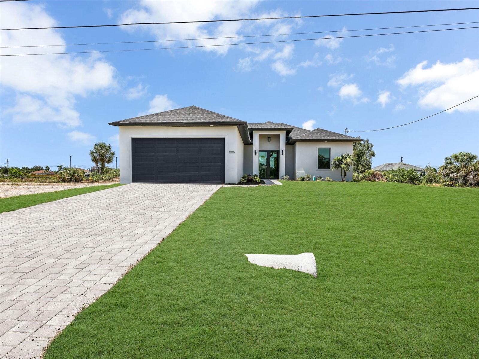 Looking for your next dream home? Check out this brand-new, move-in ready 3 bedroom plus den, 2 bath beauty nestled right on the Horseshoe Canal. Imagine waking up to peaceful water views every day from your screened-in lanai—a perfect spot for morning coffee or evening relaxation. If you love the water, you’re in luck! There’s a quick trip to Pelican Lake, and a convenient boat ramp nearby to easily launch your boat for a day of fun.  Step inside and you’ll find a modern kitchen featuring a stunning quartz waterfall island and sleek stainless steel appliances. The open floor plan makes it easy to entertain friends and family, while tile flooring throughout keeps things cool and clean. Tray ceilings add a touch of elegance in both the living area and the master bedroom, creating a spacious and airy feel.  This home is thoughtfully designed with impact-resistant doors and windows, giving you peace of mind during storm season. Plus, the non-flood zone location adds an extra layer of security. Need to run errands or grab a bite to eat? You’re just minutes away from shopping and great restaurants, making everyday living super convenient.  Whether you’re boating enthusiasts or just love a quiet spot with incredible views, this home has it all. Don’t miss out on this blend of comfort, style, and location—your new waterfront lifestyle awaits!