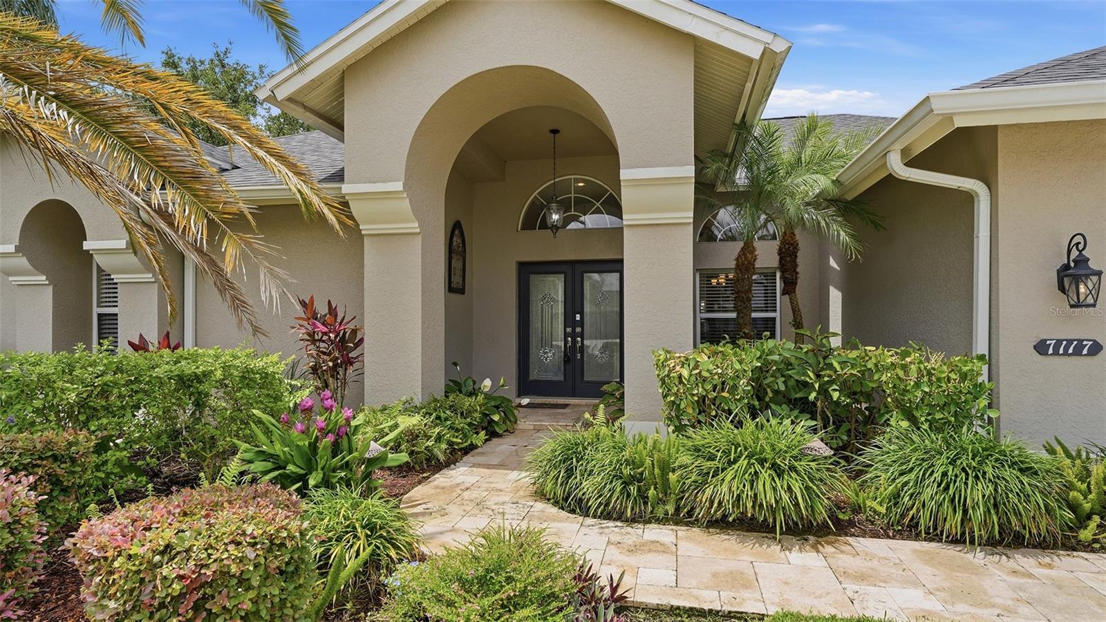 New ROOF 2025. New Quartz countertops 2026. Large lot in an amazing location in the much sought after community of River Club just minutes away from Lakewood Ranch Main Street! This TURNKEY FURNISHED OPTIONAL Arthur Rutenberg custom built home features 2551 square feet of well-planned space, with a spacious split floor plan, high ceilings, extended lanai and oversized pool to name a few. Classic 23-inch ceramic tile, on the diagonal throughout, neutral paints, open floorplan and extras like tiled fireplace and oversized sliders give a welcoming feel. Four bedroom and three baths offer ample space and privacy. Relax in your oversized outdoor covered space, view nature on the pond and just outside of your lanai. Truly a spectacular home, in the community of River Club with NO CDD, and LOW HOAs, conveniently located in close proximity to multiple entertainment districts including Lakewood Ranch Main Street, Waterside, and UTC Mall and on a large lot with mature landscaping. One round at The River Club in Bradenton will inspire you to return time and time again. This Golf Digest “Places to Play” Four Star Facility boasts a Ron Garl designed, 18-hole course perfect for seasoned golfers and beginners alike. It also houses every necessary amenity, including a restaurant with panoramic views of the course, full-service Pro Shop, golf lessons, and a driving range. Book your appointment today!