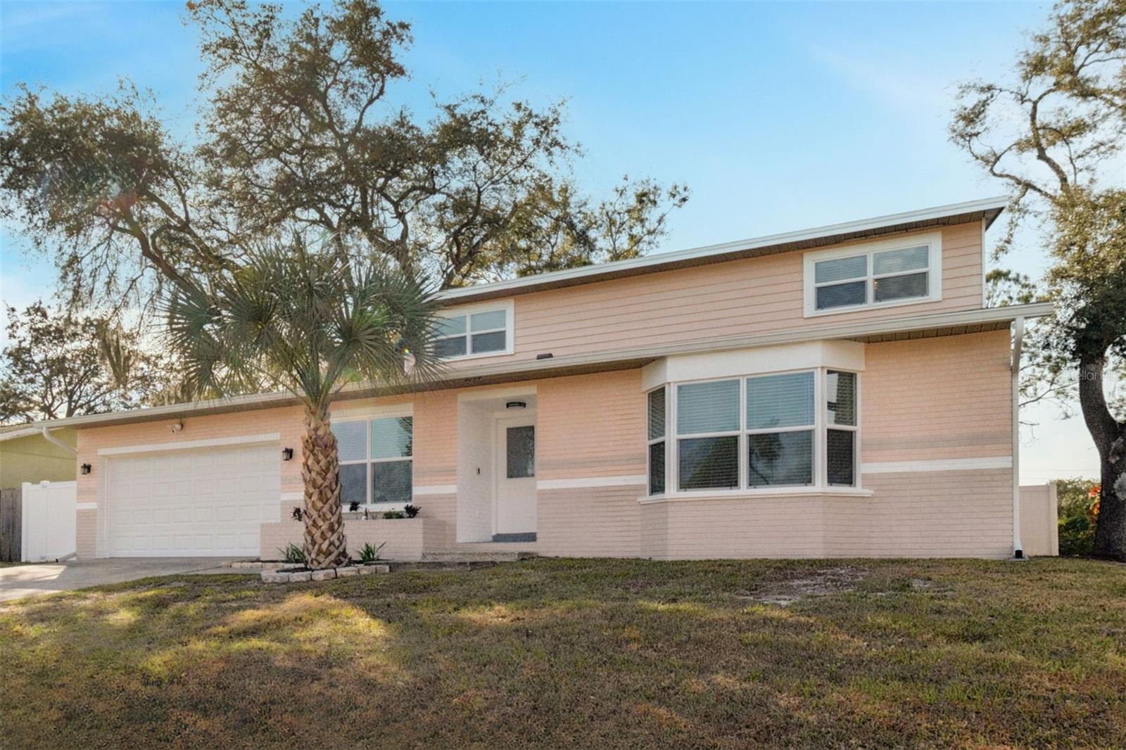 You will love this spacious two-story home in the highly desirable Safety Harbor area, ideally located near Countryside Hospital and top-rated local schools. No Flood insurance required as it in a "high and dry "X" Zone". Cleaned, well maintained and Freshly painted and thoughtfully updated throughout, this 4-bedroom, 3-bathroom home offers the perfect blend of comfort, style, and functionality.
Inside, you’ll find updated kitchens and bathrooms, beautiful new flooring, modern lighting, and a bright, inviting layout designed for everyday living and entertaining. The spacious living room, formal dining room, and family room with soaring vaulted ceilings provide flexible spaces for gathering and relaxing.
The updated kitchen features white cabinetry, quartz countertops, ample pantry storage, and a clean, contemporary feel. The well-designed floor plan offers both open living spaces and privacy where needed.
Step outside to enjoy the screened porch overlooking the fully fenced backyard with brand-new fencing — perfect for pets, play, and outdoor entertaining. Conveniently located near shopping, dining, parks, and beaches, this move-in ready home is one you won’t want to miss.
