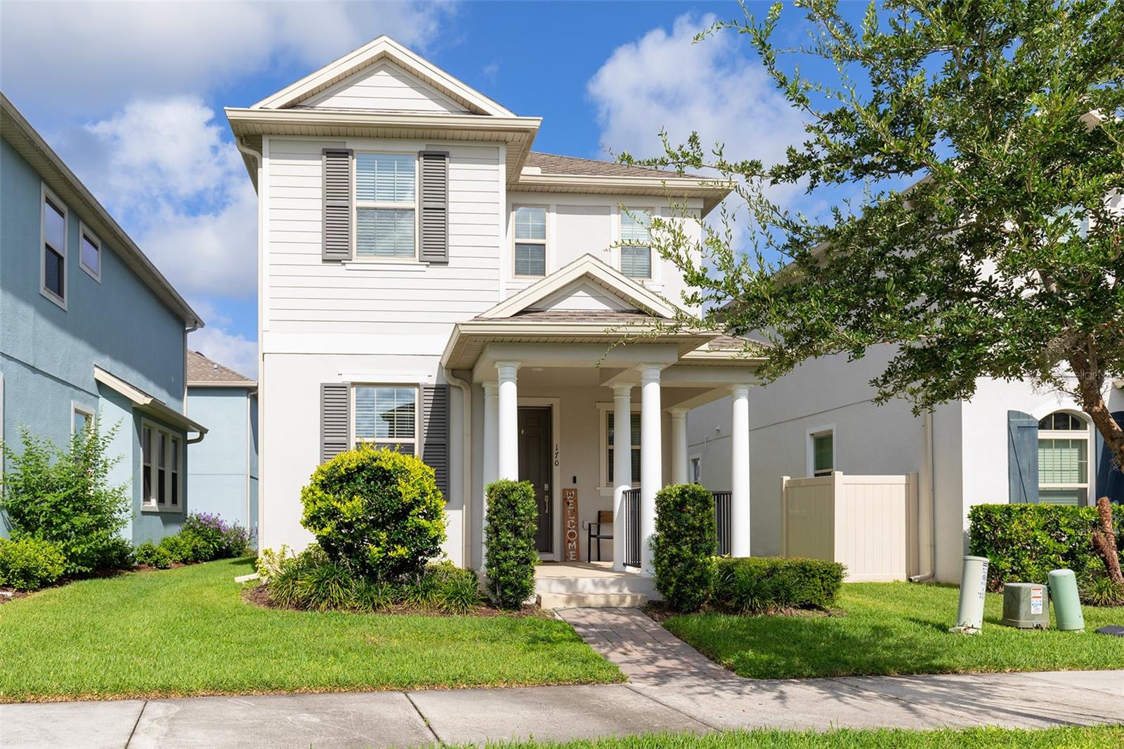 Located in the highly sought after Tuskawilla Crossings Community, this newer home blends spacious living, flexible design, and modern conveniences in one exceptional package. Offering a total of 4 bedrooms plus office and 3.5 bathrooms, this thoughtfully designed floor plan is ideal for multigenerational living, extended stays for guests, remote professionals, or anyone seeking additional privacy and versatility. The main residence encompasses 3 bedrooms, 2.5 bathrooms, and a dedicated office/flex room, while a separate 1 bedroom, 1 bath suite above the garage creates a private retreat complete with its own entrance. The main level showcases an open concept design where the family room flows seamlessly into the spacious eat in kitchen. The kitchen is beautifully appointed with 42 inch cabinetry, quartz countertops, upgraded stainless steel appliances, and a generous walk in pantry. A versatile office/flex room offers endless possibilities as a home office, playroom, fitness area, study space, or hobby room.Upstairs, the primary bedroom serves as a comfortable escape, featuring a walk in closet and a spacious en suite bath with dual vanities, a garden tub, and separate walk in shower. French doors lead to a private balcony, providing the perfect spot to enjoy a quiet morning or unwind at the end of the day. Two additional bedrooms and a full bath with dual sinks complete the second floor of the main residence. One of the home's most desirable and unique features is the private suite above the garage. Measuring approximately 19' x 16', this separate living space includes its own full bathroom, dedicated HVAC system, built-in cabinetry and private entrance, making it ideal for in-laws, guests, college aged children, a home business, or additional flex space. The remainder of the home highlights a front porch, a covered rear porch, a brick paved driveway, oversized parking area, two car garage, whole home Gigabit Wi Fi, fiber internet, smart locks, smart lighting and a 60 amp outlet ready for electric vehicle charging. Residents of Tuskawilla Crossings enjoy resort style amenities including a community pool with cabanas, playground, walking trails, multiple dog parks, and direct access to the Seminole County Trail. Ideally located just minutes from Winter Springs Town Center, shopping, dining, top rated Seminole County schools, and SR 417, this home combines modern living with exceptional convenience.