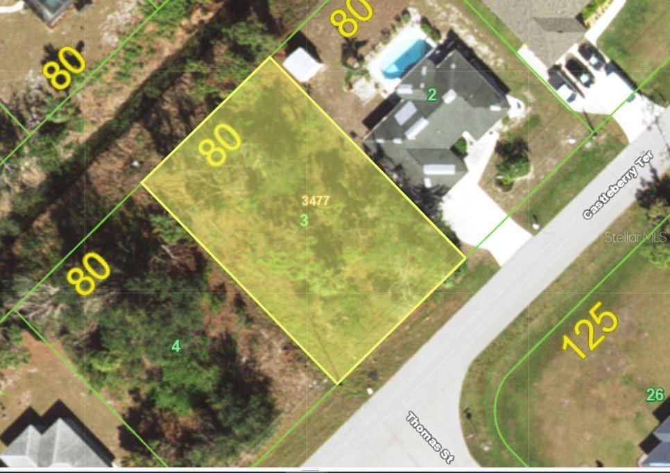 Discover the perfect opportunity to build your dream home on this highly desirable vacant lot in East Englewood. Located in Flood Zone X, no flood insurance is required. What truly sets this property apart is the added space and privacy. A generous 50-foot buffer behind the lot, created by a drainage swale, provides extra distance from rear neighbors, giving you more breathing room and a more private backyard feel. On one side of the lot, an additional drainage swale creates even more separation, making this homesite feel distanced and more secluded than most. With no HOA or deed restrictions, you have the freedom to design and build exactly what you want, whether that’s your dream home, a seasonal getaway, or an investment property. Ideally located just a short drive from the beautiful beaches of Boca Grande and Manasota Key, you’ll enjoy easy access to sun, sand, boating, and some of the best fishing Southwest Florida has to offer. Shopping, dining, golf courses, and marinas are all nearby, giving you convenience without sacrificing the laid-back coastal lifestyle. Whether you’re ready to build now or planning for the future, this property offers flexibility, privacy, and location.