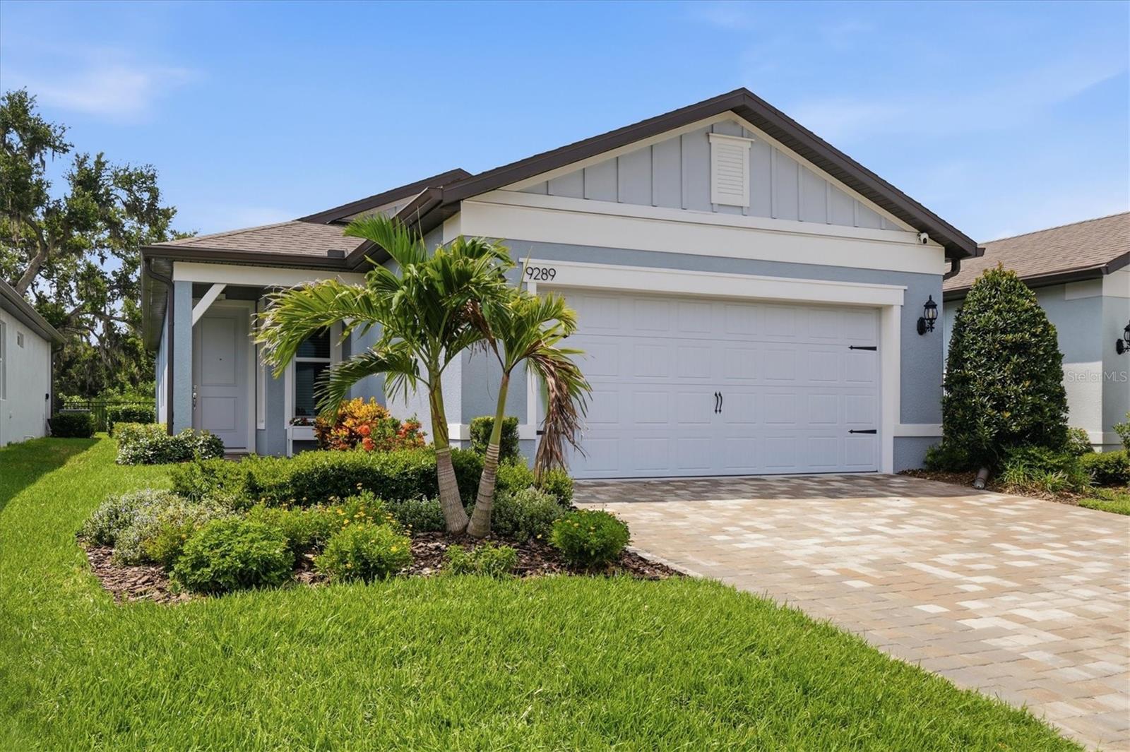 Come see this beautiful light and bright Compass floor plan.  Tucked away on a peaceful preserve lot with no rear neighbors.  Inside this open floor plan, you'll find luxury vinyl flooring, a gourmet kitchen, and a custom accent wall in the entryway. Open the sliders and head out to the extended lanai, your own private retreat overlooking the preserve. Its the perfect spot for coffee at sunrise, happy hour at sunset, or simply enjoying your peaceful views. The garage comes with an epoxy floor and overhead storage racks, giving you plenty of space to stay organized without sacrificing parking or floor space. And when it comes to parking, you'll appreciate the four foot widened driveway, giving your guests plenty of space to pull in.  Be as active as you want to be at Del Webb Bayview, with resort-style amenities, pickleball, fitness center, social clubs, and endless activities. All that's missing is you!