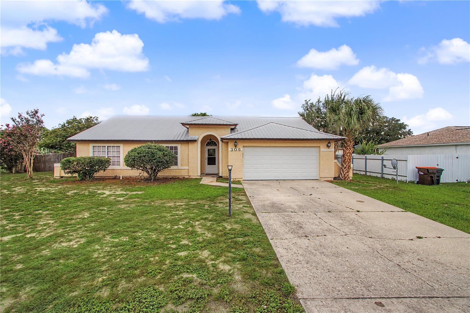 Welcome to the home you've been waiting for! Nestled on an oversized .31-acre lot in the highly desirable Silver Springs Shores area of Ocala, this beautifully updated 3-bedroom, 2-bathroom home offers the perfect combination of comfort, space, and modern style. From the moment you arrive, you'll appreciate the inviting curb appeal and warm atmosphere that make this property feel like home. Step inside to discover 1,861 square feet of thoughtfully designed living space filled with natural light and an open, welcoming layout that's perfect for both everyday living and entertaining. The spacious living room provides the ideal setting for cozy movie nights or hosting family and friends, while the formal dining room is ready for holiday gatherings and memorable dinners. At the heart of the home is a beautifully appointed kitchen featuring granite countertops, stainless steel appliances, abundant cabinetry, and generous counter space, making meal preparation a pleasure whether you're cooking for two or entertaining a crowd. The adjoining breakfast area creates the perfect spot to enjoy your morning coffee while planning the day ahead. When it's time to unwind, escape to the spacious primary suite, designed as your own private retreat. Enjoy walk-in closets and a luxurious en-suite bathroom complete with dual granite vanities, a relaxing soaking tub, and an oversized dual walk-in shower that brings a spa-like feel to your daily routine.Need extra space? The fully enclosed bonus room offers incredible flexibility and can easily serve as a home office, media room, playroom, fitness area, or guest retreat—tailored to fit your lifestyle. This home has been lovingly maintained and offers valuable updates for added peace of mind, including new A/C ductwork (2020) and a newer A/C system (2023), providing year-round comfort and efficiency. Step outside and imagine all the possibilities in your expansive backyard. With plenty of room to add a pool, create a beautiful garden, build an outdoor kitchen, or simply enjoy evenings under the Florida sky, this outdoor space is ready to become your personal oasis. Located within the desirable Lake Joy community, residents enjoy access to nearby parks and scenic ponds perfect for fishing, relaxing, and enjoying the outdoors—all while benefiting from an incredibly low HOA fee of just $14/ month. You'll also love the convenience of being just minutes from shopping, dining, schools, medical facilities, and everything you need just right around the corner.