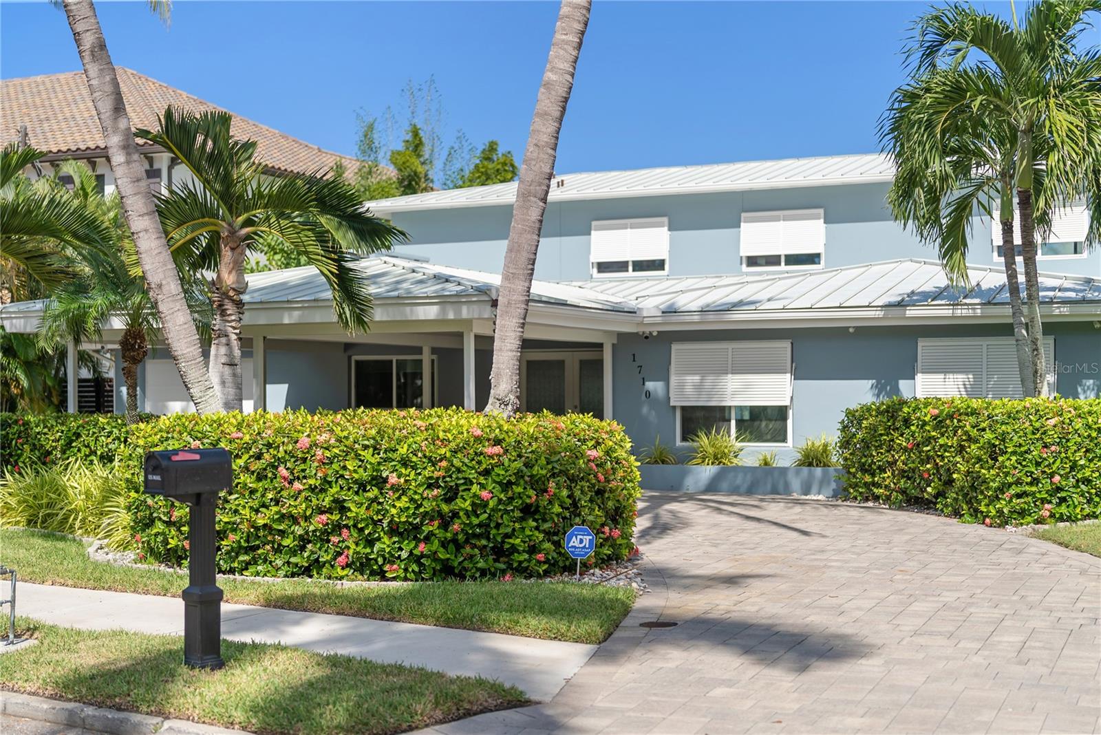 WELCOME TO COASTAL LUXURY LIVING AT ITS FINEST!!! Nestled in one of Bradenton’s MOST DESIRABLE WATERFRONT neighborhoods and just minutes from downtown, this turnkey, fully furnished home defines true coastal elegance. Enjoy DIRECT WATER ACCESS and set out on the water in your Yamaha 24' Jet Boat, included with the property.

From the moment you enter, you’ll be captivated by breathtaking PANORAMIC WATER VIEWS that can be enjoyed from nearly every room. Custom craftsmanship and exquisite finishes are showcased throughout, giving this home an undeniable sense of quality and warmth.

The gourmet kitchen is a chef’s dream, featuring 42-inch wood cabinetry, a stunning 15-foot granite island, brand new stainless steel gas stove and dishwasher, under-mount single-bowl sink, and ample space for multiple cooks. Just off the kitchen, the spacious living and dining areas boast coffered ceilings and expansive water views, creating a seamless flow perfect for entertaining.

The home’s interiors have been beautifully refreshed with brand new tile floors, baseboards, and doors, along with elegant plantation shutters throughout. Two bedrooms and 2.5 baths are conveniently located on the main level, while the luxurious primary suite upstairs offers sweeping water views and a spa-like ensuite bathroom. An additional bedroom doubles as a guest or flex space with a built-in Murphy bed. The laundry room is outfitted with a dedicated split AC unit, and the features new stove washer and dryer for modern convenience.

STEP OUTSIDE TO YOUR PRIVATE OUTDOOR OASIS, where Florida living truly shines. A saltwater heated pool and spa overlook the water, surrounded by lush landscaping. The outdoor kitchen and a gazebo with new fans provide the perfect setting for alfresco dining and entertaining. A mosquito mist system with 35 nozzles ensures year-round comfort, and two storage sheds with hurricane tie-downs provide generous space for tools and toys. The property also includes a well that provides recycled water for irrigation, helping maintain the vibrant tropical landscape.

Boaters will appreciate the impressive dock setup, complete with a new 6,000-lb boat lift, a 13,000-lb lift, and a Jet Ski lift. From your backyard, enjoy a short 15-minute boat ride to the Gulf of Mexico or a 25-minute cruise to the Skyway Bridge, with plenty of waterfront restaurants and day docks nearby.

THIS HOME IS AS PRACTICAL AS IT IS BEAUTIFUL, equipped with a full-house generator, hurricane-impact windows and sliding doors, and a water softener system. Comfort is ensured with two AC units replaced in 2020, a 3-zone system updated in 2023, and two new tankless water heaters. The air conditioning units are raised on a concrete pad for added protection. A durable metal roof and paver semi-circular driveway complete the home’s stunning curb appeal.

Freshly painted inside and out, this move-in-ready home has been meticulously maintained and thoughtfully updated. Experience the best of Florida’s waterfront lifestyle—where luxury, comfort, and coastal charm come together in perfect harmony.

THIS IS THE ONE YOU’VE BEEN WAITING FOR—YOUR SLICE OF PARADISE ON THE WATER.