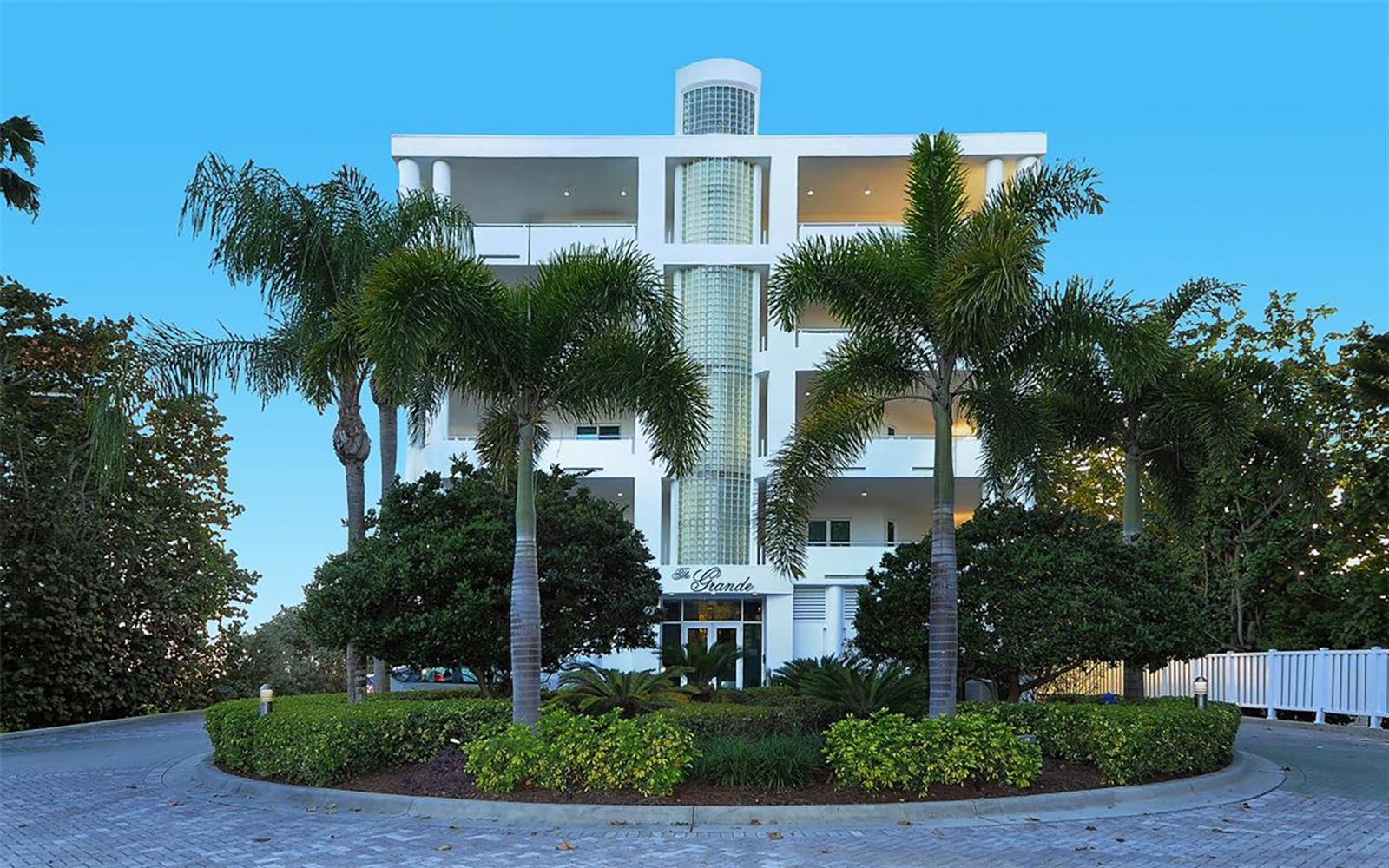 Spectacular North west corner three bedroom condo with direct beachfront views at The Grande, a oasis with only 8 residences. This is Florida living at its very best! This second floor corner location has breathtaking views of the Gulf of Mexico and miles of beautiful sandy beach plus some views of Sarasota Bay and amazing sunsets. A fantastic wrapping terrace on the Gulfside offers outdoor enjoyment from the main living area and master suite. Two other terraces off the additional bedrooms with privacy and wonderful views. This true three bedroom, all with private baths, is 3260 square feet. A Gulf front gourmet kitchen with high end appliances has an adjacent family gathering area. The open plan flows from the living room area to the dining room and the floor to ceiling windows that dramatically overlook the Gulf of Mexico and beach, enhance the brightness and open feeling of this home. This home has 10 foot ceilings,  and comes with a private enclosed two car garage with direct access.This Longboat location is near many outstanding restaurants and Anna Maria Island. Watch dolphins and manatees and so many Florida birds glide past your backyard. The azure waters of the Gulf of Mexico and the beach are just steps away.