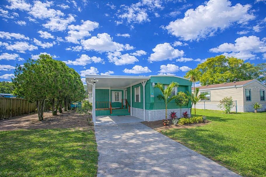 Fully remodeled and move-in ready 4-bedroom, 2-bath manufactured home offering space, comfort, and income potential! Situated on a 0.18-acre lot, this property includes a laundry room, additional storage, and a separate shed for added convenience. The home has been tastefully updated with modern laminate flooring, along with a beautifully renovated kitchen and bathrooms.  A security system is also in place, providing added peace of mind.

Located in a peaceful community just minutes from shopping, dining, and entertainment, this property combines tranquility with accessibility. A standout feature is its flexible layout—large enough to be divided into two 2-bedroom, 1-bath units, making it perfect for generating passive income while living in one side.

Additionally, the lot ownership helps avoid monthly rental fees, adding even more value. Whether you're an investor or looking for a primary residence with income potential, this is an opportunity you don’t want to miss!