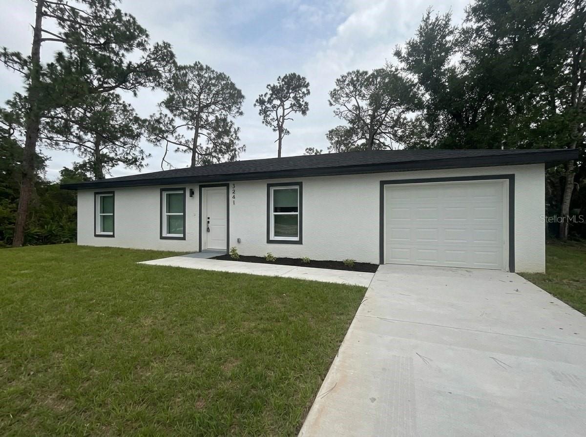BRAND NEW HOME with modern upgrades! Located in the desirable Sun N Lake of Sebring community, this beautifully designed 3-bedroom, 2-bath home offers a perfect blend of style and functionality. This 1420 sq ft home features a contemporary open-concept layout with sleek cabinetry, elegant countertops, and a stunning accent wall that adds warmth and character to the living space. The kitchen is thoughtfully designed with modern finishes and a functional island, perfect for everyday living and entertaining. Enjoy upgraded details throughout, including stylish lighting, wood-look flooring, designer bathroom finishes, and a glass-enclosed shower. The spacious bedrooms and well-appointed bathrooms provide comfort and a clean, modern feel. Additional highlights include a 1-car garage and a clean exterior design with a fresh, modern look. Don’t miss the opportunity to own this move-in-ready home with upgraded finishes—schedule your showing today!