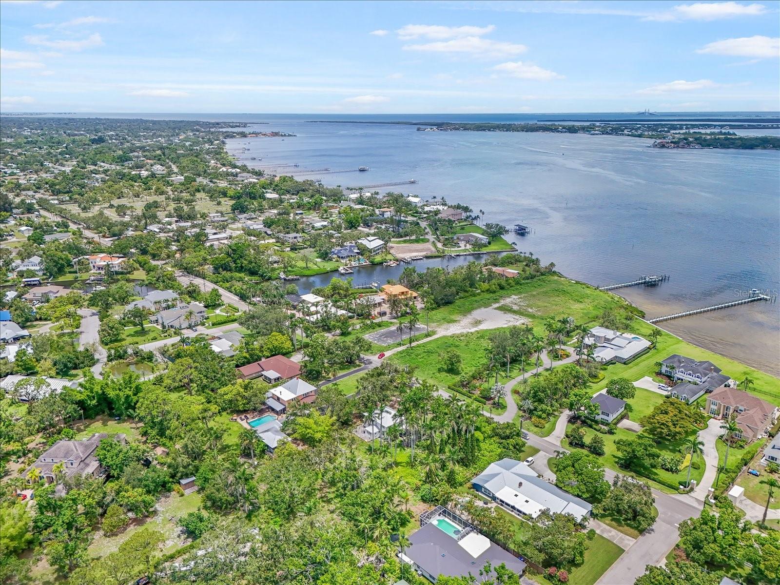 ~BUILD YOUR OWN DREAM HOME with this prime opportunity in the heart of West Bradenton's River District. Combine convenience with endless possibilities on this large approx. .68-acre (slightly less than half of the current 1.38-acre) roughly, 100x300 parcel. Located on desirable & sought after Riverview Boulevard along the Manatee River. This vast approx. 29,500 SqFt. (Slightly less than half of the current 60,000 SqFt.) lot has so much potential. Lush and lined with gorgeous mature trees & beautiful royal palms this property is rich in history and would make for an extraordinary family home. Enjoy easy access to downtown, waterfront dining, and the stunning beaches of Anna Maria Island. Lewis Park is also nearby, and St. Stephen's School is just a block away. Bring your vision to life. **this is for the vacant lot EAST, of the home** Do not miss out on creating your perfect residence in this wonderful community!