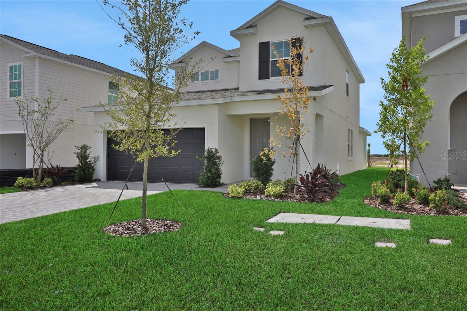 Virtually Staged. Under Construction. Spacious 4-bedroom, 2.5-Bath home located in Punta Gorda’s newest resort-style, low-maintenance community, Turnleaf. This open-concept two-story home features a modern kitchen with modern grey shaker-style cabinetry and white quartz countertops, complemented by a white subway tile backsplash. Wood-look laminate flooring throughout the entry, Kitchen, dining, stairs, and great room. Oversized sliding glass door leads to your covered lanai and backyard oasis. The second story features a spacious loft area, 3 secondary bedrooms and a modern bathroom equipped with a dual sink vanity. Conveniently located minutes from historic downtown Punta Gorda, the area’s finest marinas, the area’s top golf courses, Punta Gorda Airport, Peace River Botanical Gardens, Miles of nature trails at Charlotte County Nature Preserve and more!