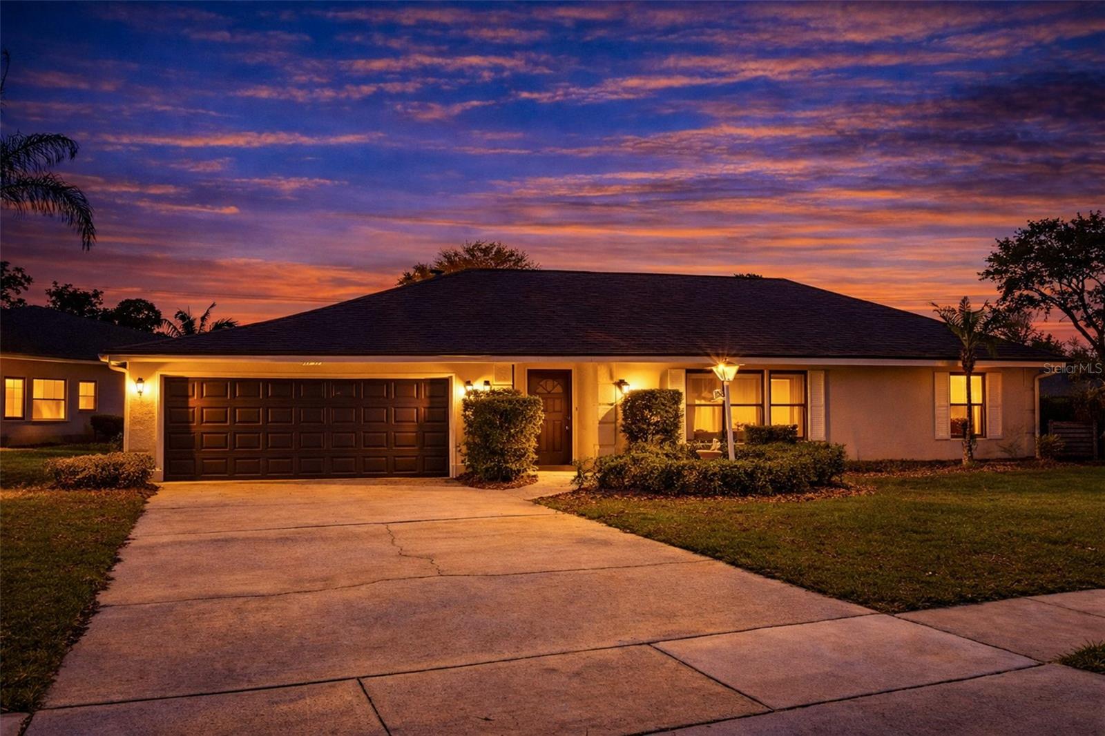 One or more photo(s) has been virtually staged. SELLER TO GIFT BUYER WITH $5K AT CLOSING if closed within 30 days of contract date. Welcome to an extraordinary opportunity in the heart of Altamonte Springs—where luxury, lifestyle, and location come together in perfect harmony. This breathtaking 4-bedroom, 2-bath residence at 150 Lake Destiny Trail is more than a home—it’s a statement. Perfectly positioned on an oversized canal-front lot, this 2,115 square foot showpiece has been exquisitely updated and styled to captivate from the very first glance.

Step through the doors and prepare to be impressed. A stunning foyer adorned with a custom stone accent wall sets an elevated tone, welcoming you into a home that effortlessly blends sophistication with warmth. To your right, an expansive living room invites unforgettable gatherings, while the open-concept design flows seamlessly into a dining space and a truly remarkable kitchen. Designed to impress, the kitchen boasts an abundance of cabinetry, sleek finishes, stainless steel appliances, and a coveted gas stove—perfect for both everyday living and elevated entertaining.

Just beyond, a cozy yet refined family room creates the ultimate retreat, featuring a striking stone fireplace that anchors the space—ideal for intimate evenings, lively game nights, or simply unwinding in style.

The thoughtfully designed split floor plan offers three generously sized secondary bedrooms, while the private primary suite is tucked away as its own serene escape. This luxurious retreat features a spacious bath, dual closets, and a sense of privacy that feels like your own personal sanctuary.

Step outside and experience the essence of Florida living at its finest. Your screened-in lanai opens to a sparkling in-ground pool, surrounded by an expansive backyard with endless possibilities. Enjoy a dedicated fenced area for pets, and take full advantage of your private canal frontage—perfect for launching kayaks, small boats, or simply embracing tranquil waterfront living.

Every inch of this home has been carefully curated, featuring fresh paint, upgraded flooring, modern fixtures, and countless designer touches throughout—truly move-in ready and beyond compare.

Located within the highly coveted Spring Lake Hills community, residents enjoy 24-hour guard-gated security, private access to three scenic lakes, community boat ramps, and recreational amenities including tennis and pickleball courts.

Just minutes away, the vibrant energy of Cranes Roost Park awaits—offering year-round events, premier shopping, and exceptional dining experiences. With effortless access to Interstate 4, commuting to Orlando and beyond is seamless.

This is more than a home—it’s a lifestyle, a retreat, and a rare find all in one. Schedule your private showing today and experience the allure for yourself before it’s gone. Some photos have been virtually staged.