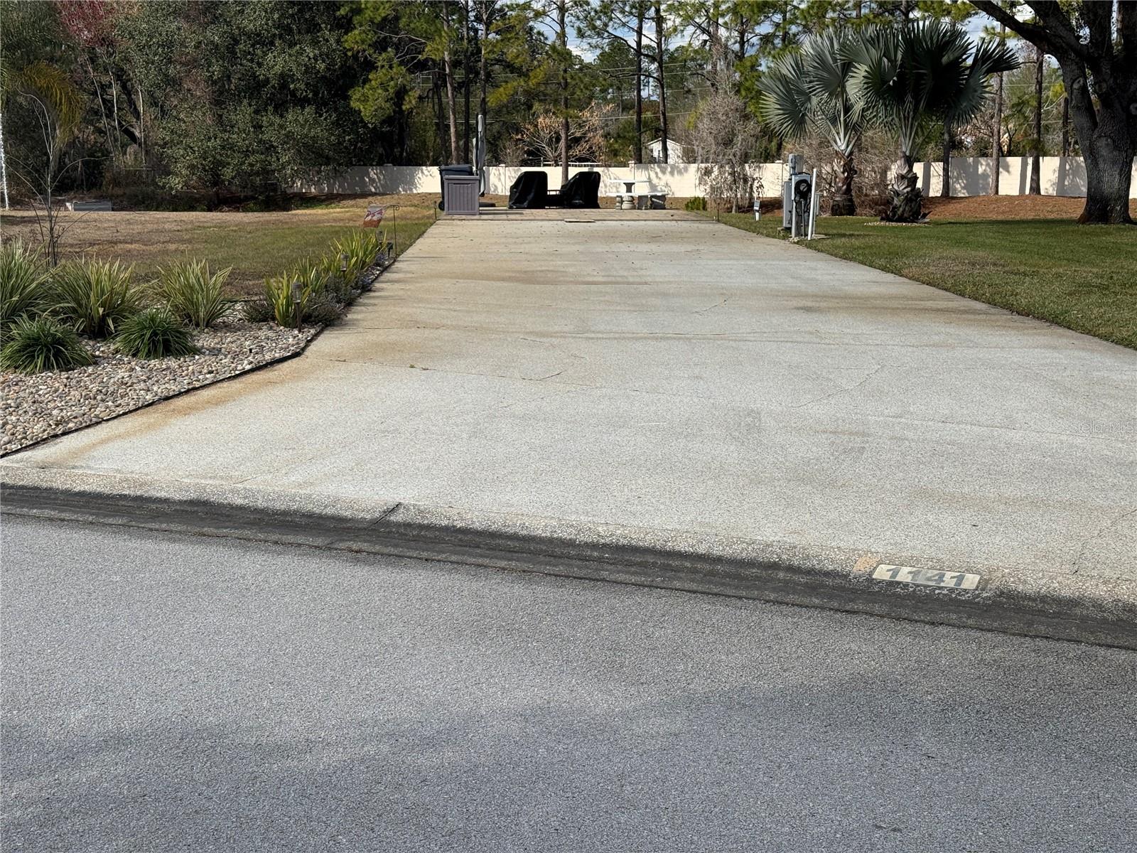 This lot in the sought after community of Mt. Olive Shores North is in the perfect location.  An extra long property line gives you many options to build if you choose.  It has a beautiful view of a pond with privacy when you want to relax and just enjoy the sound of the fountain.  With it's well kept landscaping including irrigation it is ready for you to just pull in and relax.  
The community boasts two clubhouse with plenty of activities including, cards, pickleball, shuffleboard and entertainment just to name a few.  If you are tired of the colder weather, come on over for a tour.
Call today for an appointment.