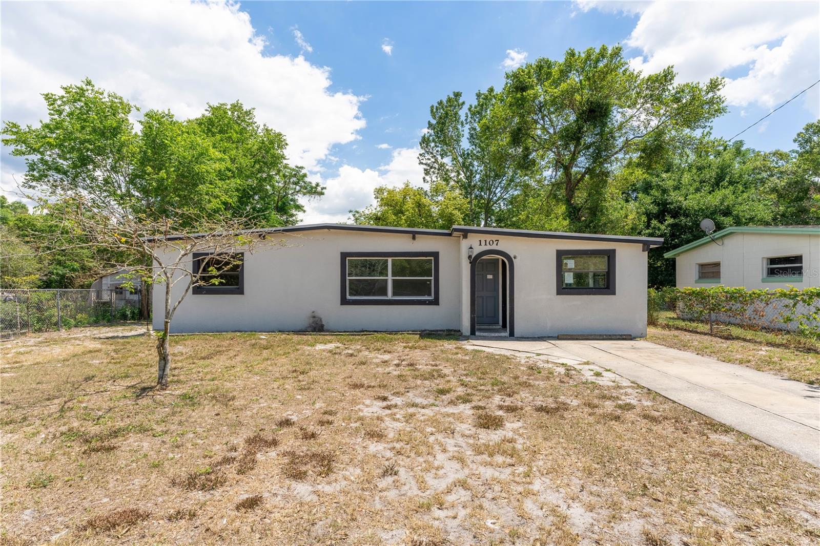 Welcome! This two-bedroom, one-bathroom home presents an excellent opportunity in the heart of Ocoee. Inside features vaulted ceilings, with a spacious living area and bedrooms, and a dedicated den/study, providing a versatile home fit for life’s ever-changing needs. Its private backyard adds to the versatility, offering a lovely outdoor space prime for relaxing or entertaining. The location offers exceptional convenience with proximity to schools, local shopping and dining options, highway access, and a variety of recreation activities, including Forest Lake Golf Club, Jim Beech Recreation Center, and numerous parks, placing everyday needs and entertainment activities just moments away. Don't miss this opportunity, schedule your private showing today! Cash or Renovation Loan ONLY.