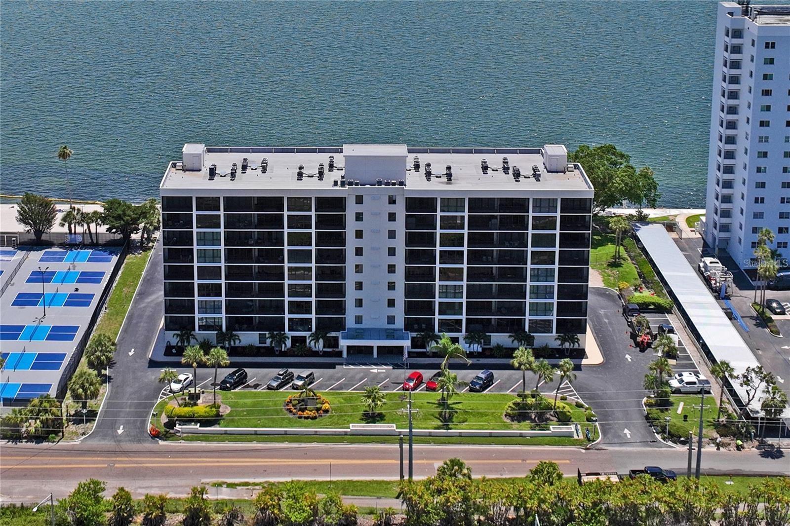 Owner wants sold now! Owner financing available. Wake up to breathtaking bay views and peaceful sunrises every morning in this beautifully updated fifth-floor
waterfront condo. With stunning panoramas of the open bay, downtown Tampa, and Bradenton, this two-bedroom, two-bath residence is a
peaceful retreat that brings vacation vibes into your everyday life. Whether you're watching dolphins dance in the shimmering waters or enjoying
the glow of the Skyway Bridge in the distance, this home offers relaxation and inspiration in equal measure. Both spacious en suite bedrooms
offer direct access to private balconies through sliding glass doors, inviting you to step out and soak in the gorgeous Florida sunshine and ocean
breeze. Floor-to-ceiling windows in the main living area ensure that every moment is enhanced by a wide-open bay view that never gets old. The
layout is designed with flow and function, offering an open-concept living, dining, and kitchen area ideal for both entertaining and quiet moments.
This move-in-ready unit has been thoughtfully updated throughout, including newer wiring, plumbing, windows, and flooring. The kitchen stands
out with handcrafted wood cabinetry, gleaming granite countertops, a tasteful tile backsplash, stainless steel appliances, and storage space that
will delight any home chef—including two generously sized pantries. Additional details that make life more convenient include two separate
entries into the condo from the hallway, an expanded walk-in closet in the primary bedroom, and a total of seven closets throughout the unit.
With extra storage located nearby in the hallway, clutter becomes a thing of the past. Yes, even beach gear and paddle boards have a place to call
home. This condo comes with an assigned under-building parking spot measuring approximately 10 feet by 20 feet—no more summertime seat
burns from direct sun exposure. Community amenities include a heated pool for year-round dips, a fishing pier for your daily catch (or at least
trending Instagram photos), and nearby access to walking and biking trails perfect for active Florida living. Located just minutes from the beaches
of St. Petersburg, downtown attractions, and major highways, convenience meets coastal comfort in perfect harmony. Downtown St. Petersburg,
with its bustling restaurant scene, arts venues, and weekend markets, is just a short drive away. You’ll also be within easy access to Tampa,
Clearwater, Bradenton, and Sarasota—all prime locations for travelers, foodies, and explorers alike. Love getting around by kayak or paddleboard?
The nearby bay waters are your playground, just steps from home. Prefer dry land? Stroll through Maximo Park, only a short walk away, or
explore the trails where locals enjoy morning runs and sunset strolls. Weekly laundry? Not a problem—laundry facilities are located close by on
each floor for added convenience. This pet-friendly community welcomes residents of all ages and hosts seasonal events that bring neighbors
together in celebration. The monthly fee includes utilities and services such as water, sewer, trash pickup, internet, cable, and common area
maintenance—offering you a carefree style of living that lets you focus more on relaxation and less on bills. Best of all, this condo is being sold
furnished, with the exception of the primary bed, dresser, and two nightstands—so you can pack your bags and move right in.