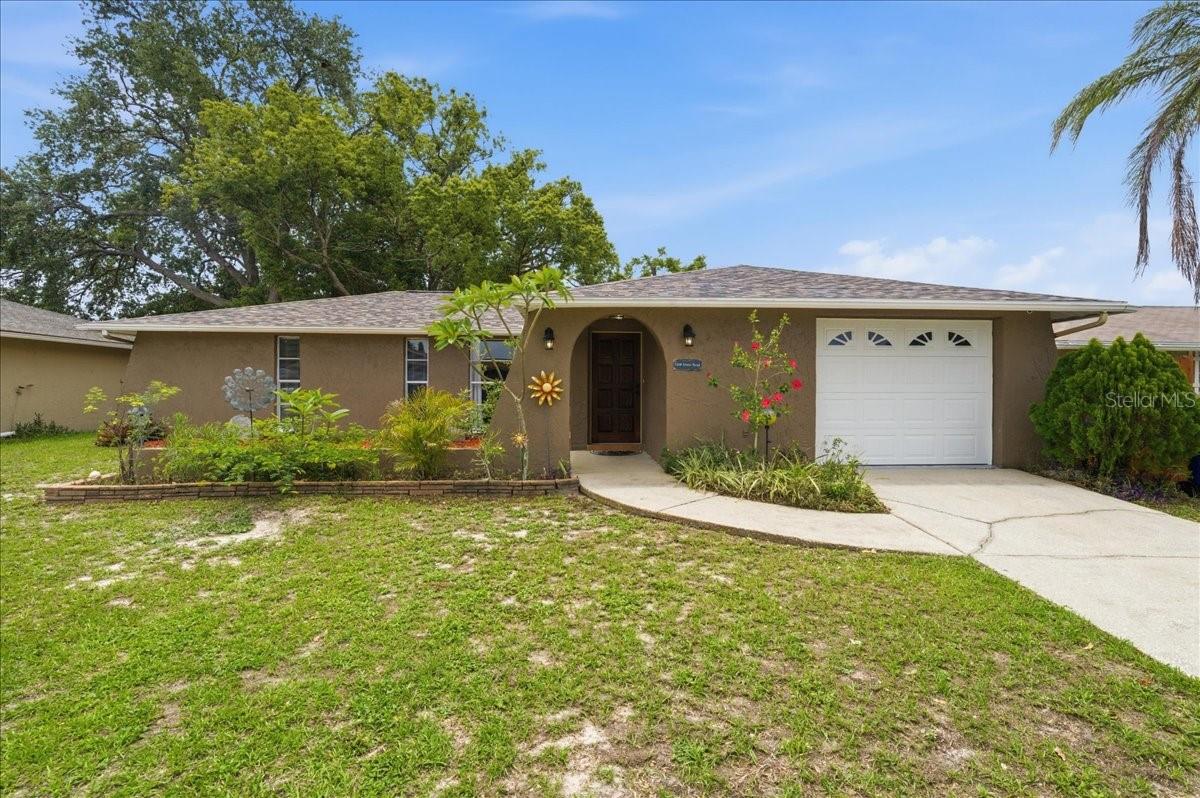 Located on the east side of Stone Road near San Miguel in the established Embassy Hills community, this beautifully maintained 2 bedroom, 2 bath home offers the perfect combination. Inside, you'll find granite countertops, updated flooring, and a warm, inviting layout that's ready for its next owner. Step outside to a fully fenced backyard with a privacy fence and shed, providing plenty of space for pets, outdoor gatherings, or simply enjoying Florida's beautiful weather. Conveniently located near Ridge Road, the Suncoast Parkway Extension, and US-19, this home offers an easy commute to both Pinellas and Hillsborough Counties. You'll also appreciate being just minutes from shopping, restaurants, grocery stores, medical facilities, Home Depot, Lowe's, and all the everyday conveniences you need. Whether you're looking for your first home, downsizing, or searching for a seasonal Florida retreat, this home is an amazing opportunity in a location you'll love cause you'll be close to everything!